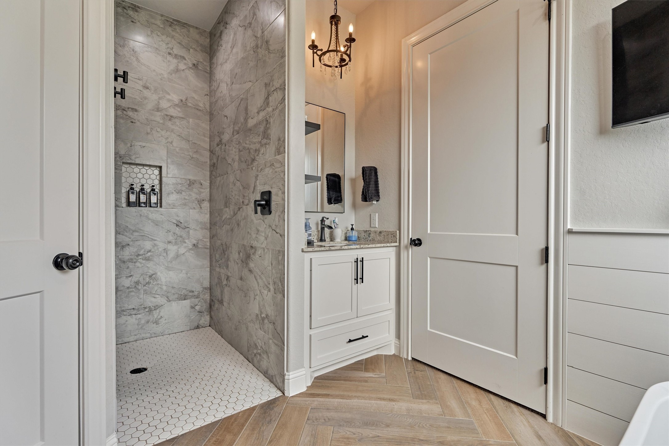 Secondary sink and walk in shower