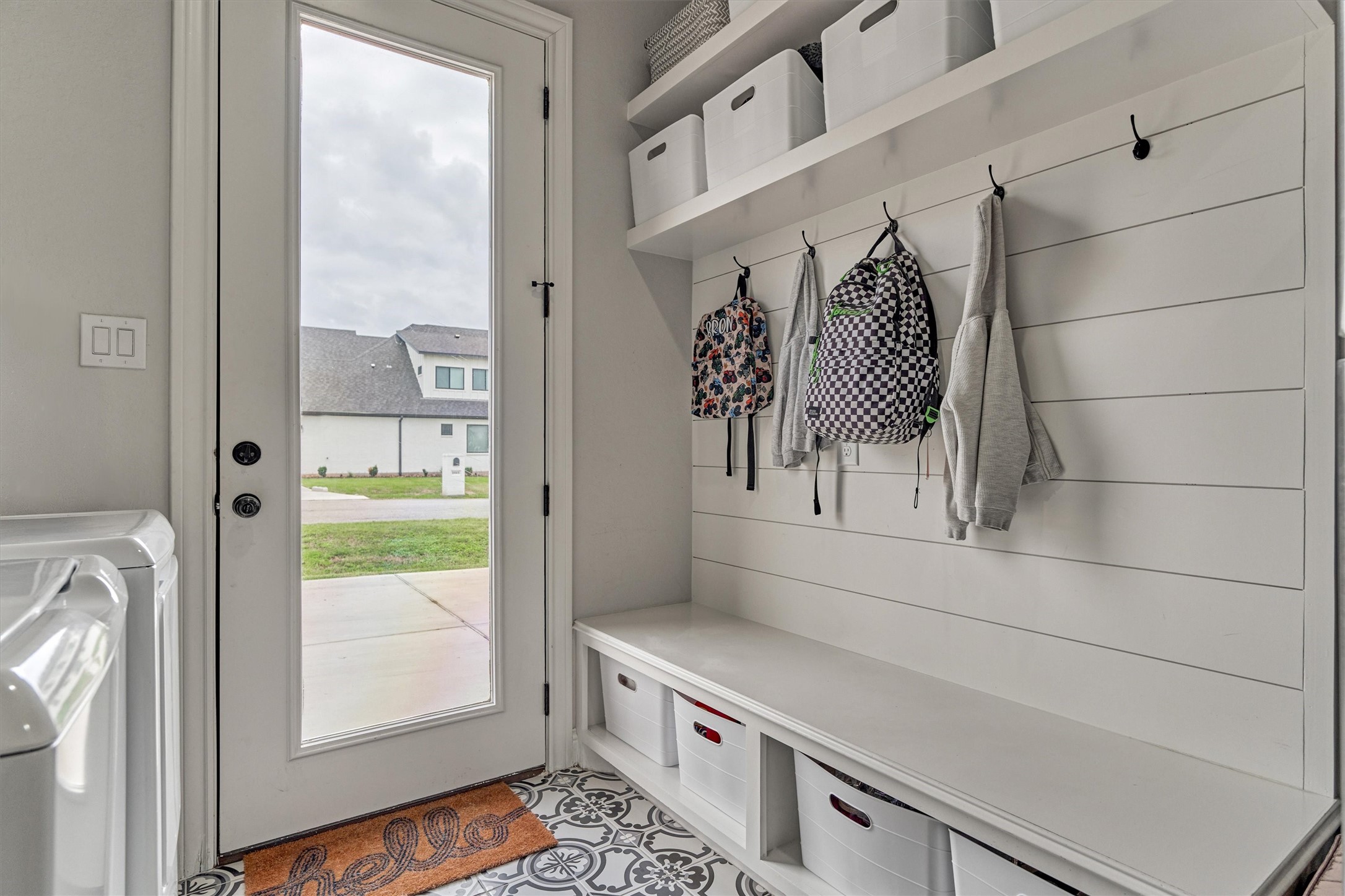 Entry from the garage side of the house with mudroom