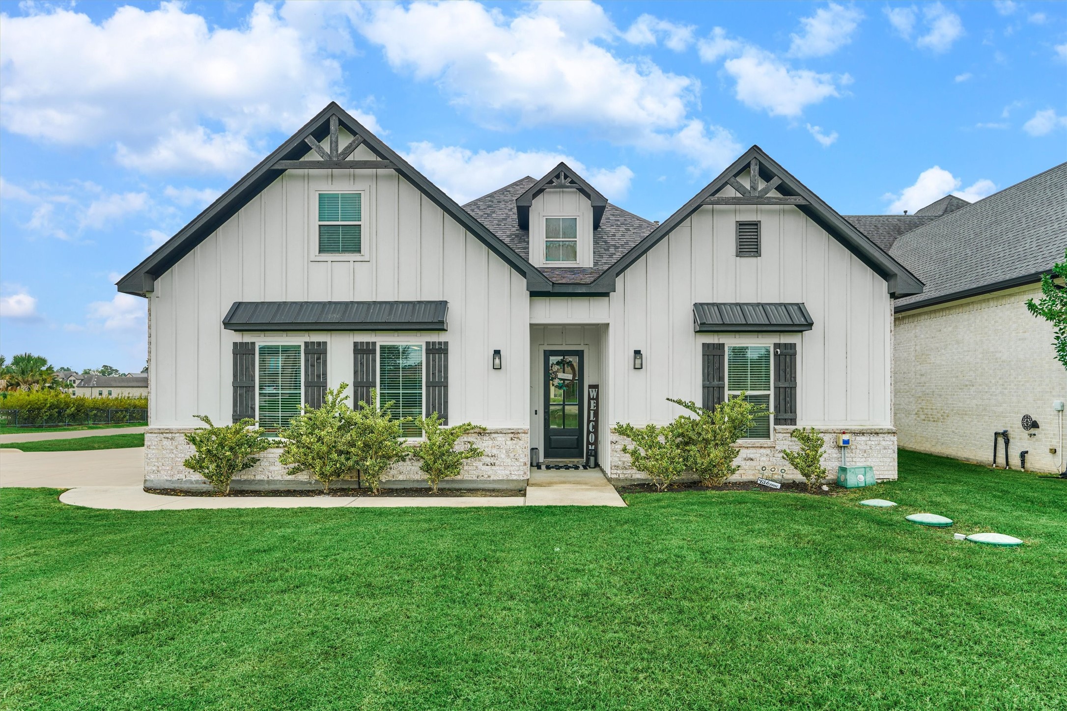 This home features a beautiful front entryway, with side parking and 3 car garage.