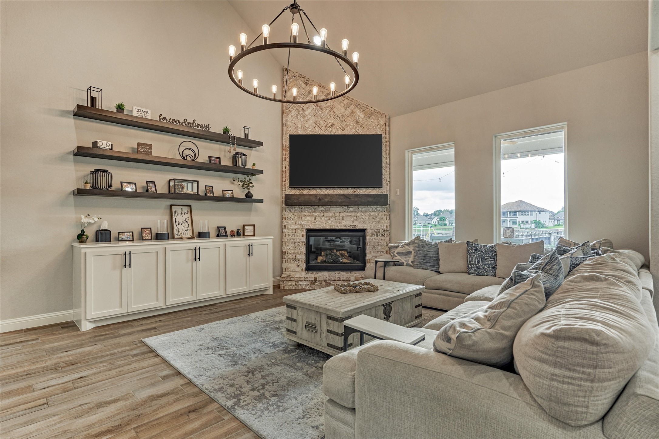 Living area with custom cabinetry and shelving.