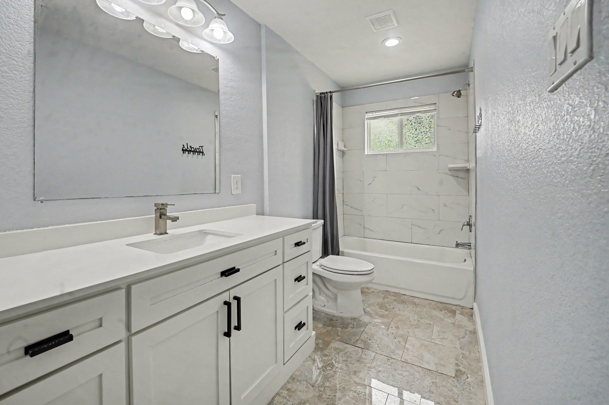 The master bathroom and the closet are updated and great size.