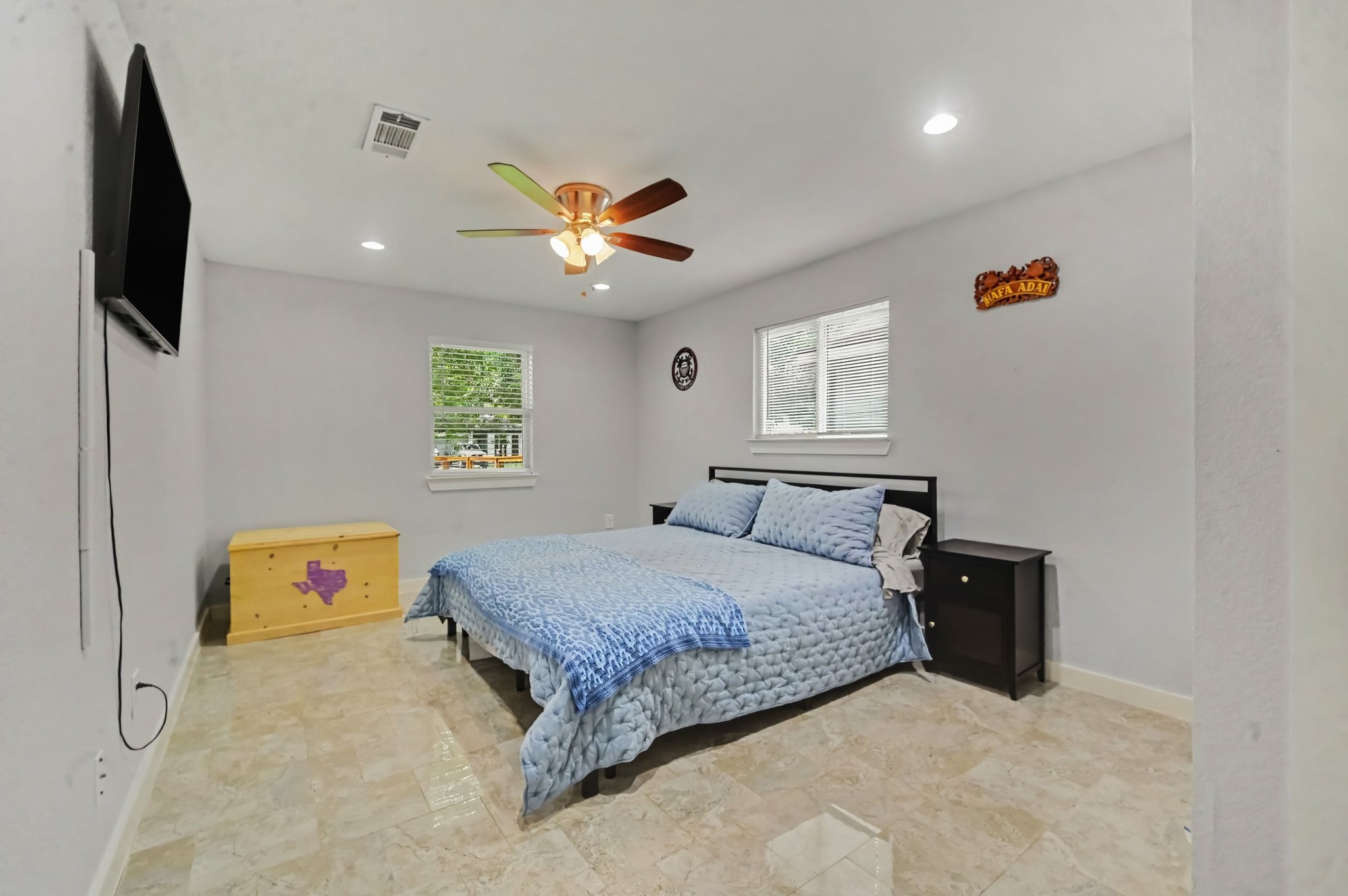 The master bedroom is very generous sized with an abundance of natural light.