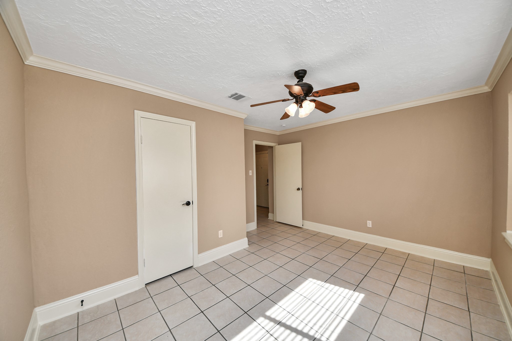 Conveniently situated on the lower level, it offers added privacy and separation from the upstairs primary suite!