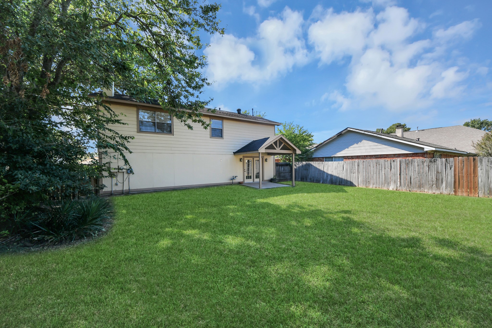Imagine the possibilities with this generously sized backyard.