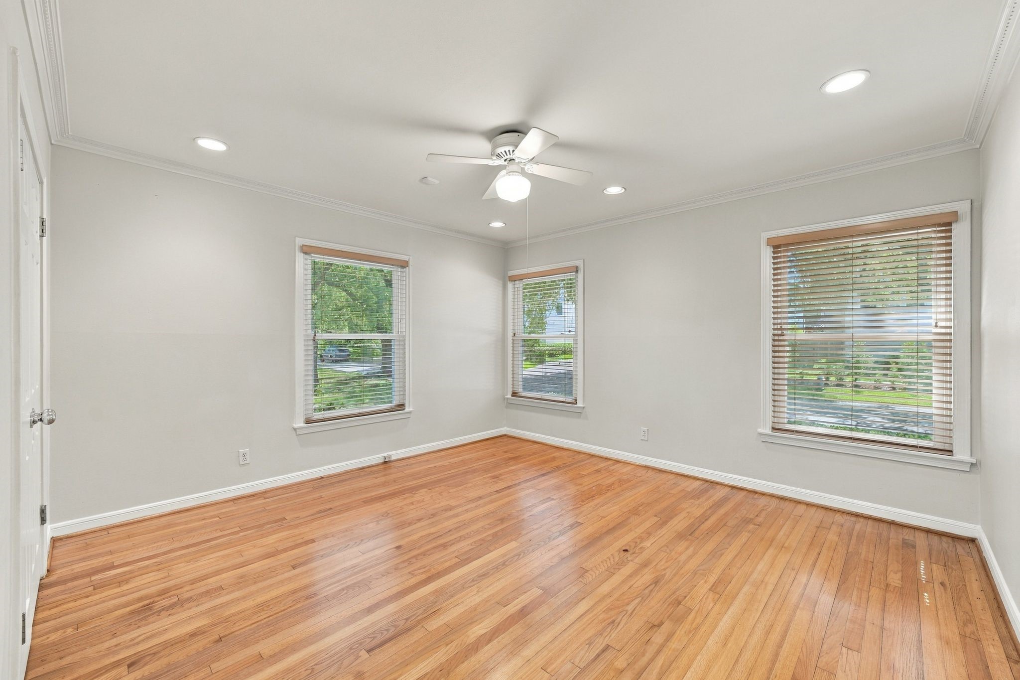 Front bedroom has a large closet and three windows overlooking Macarthur St