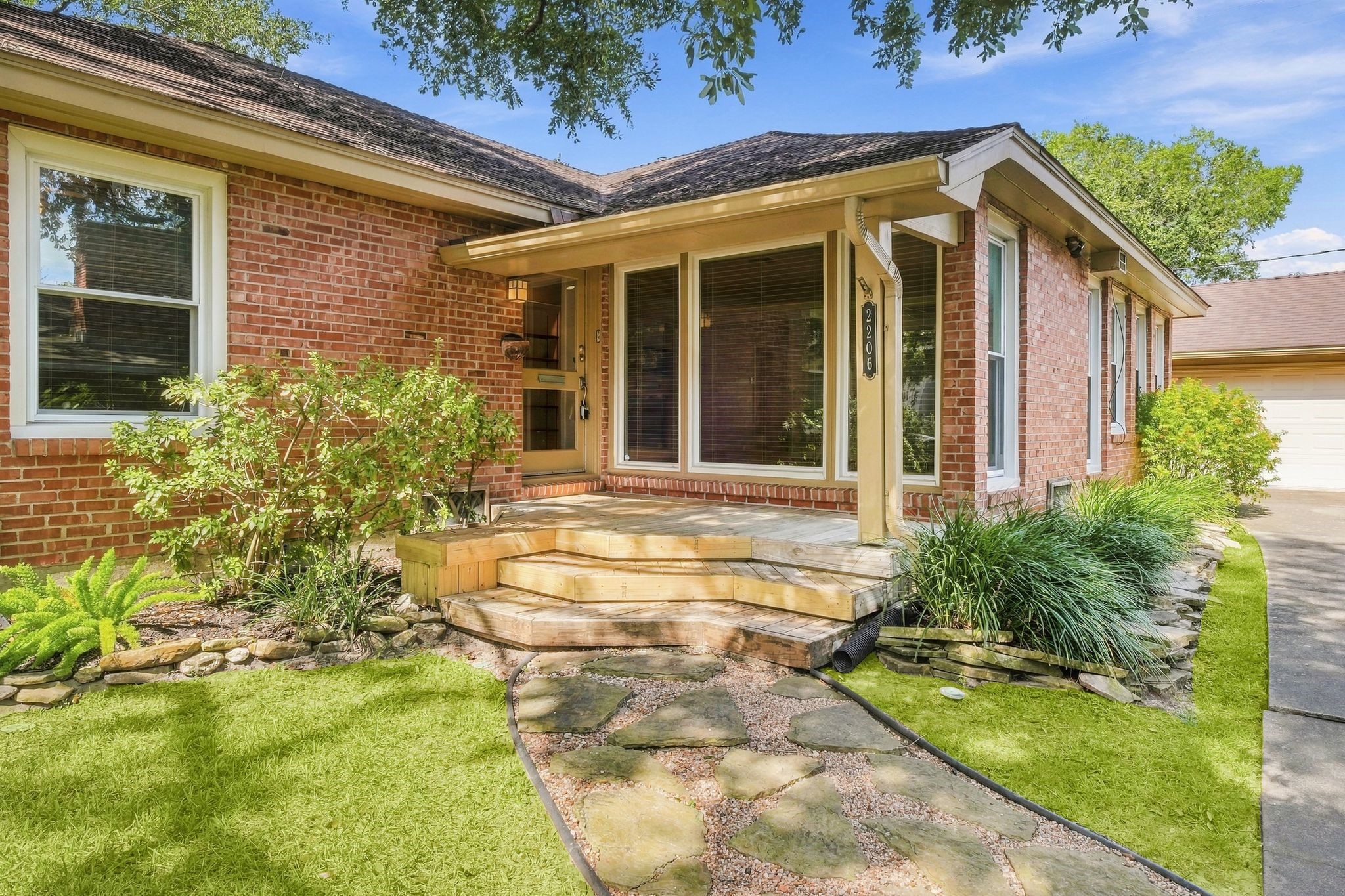 Inviting front entrance and covered porch