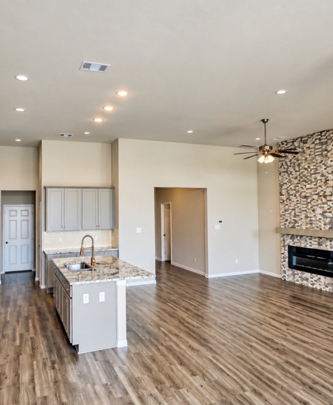 FAMILY ROOM WITH COZY FIREPLACE