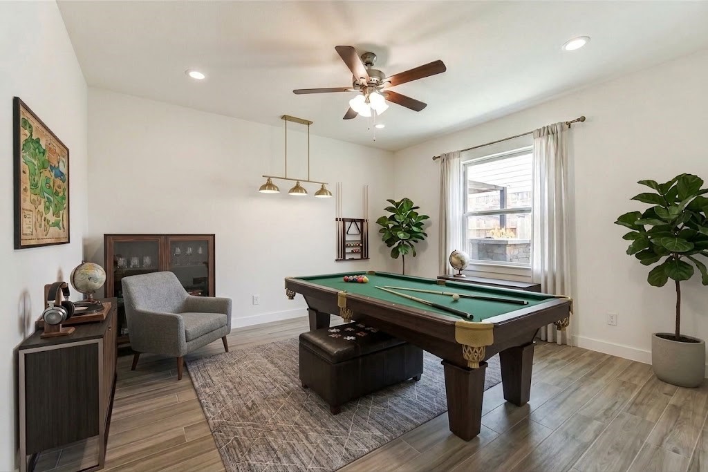 Flex area virtually staged as game room.