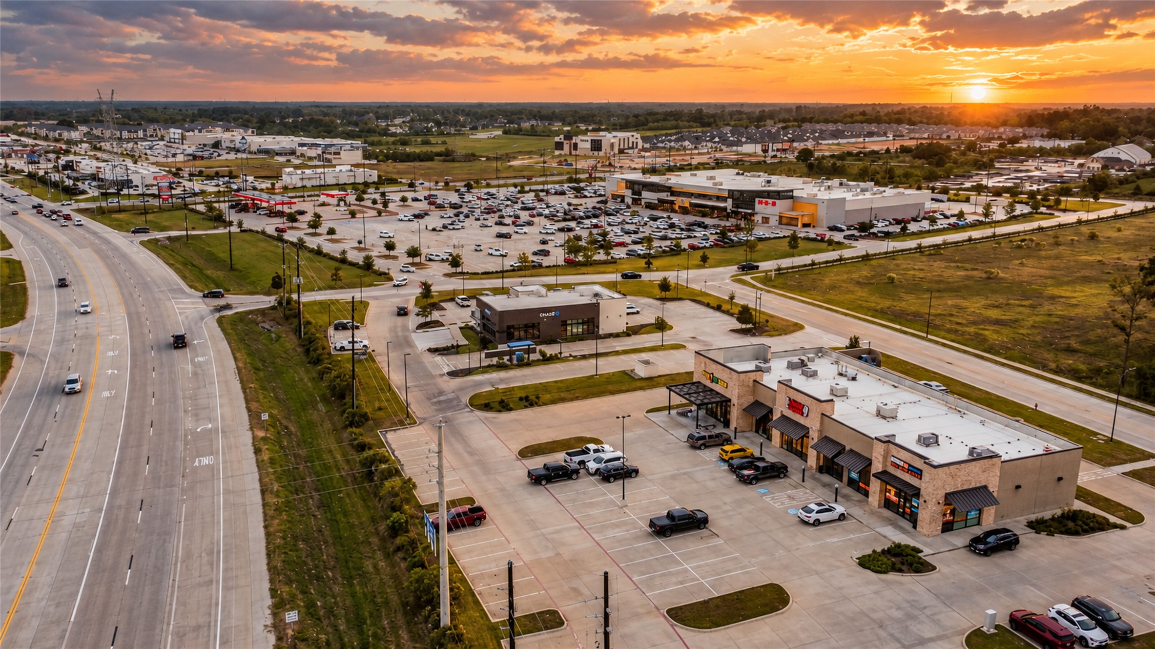 An aerial look at area retail and dining, complementing the wooded surroundings of High Meadow Estates.