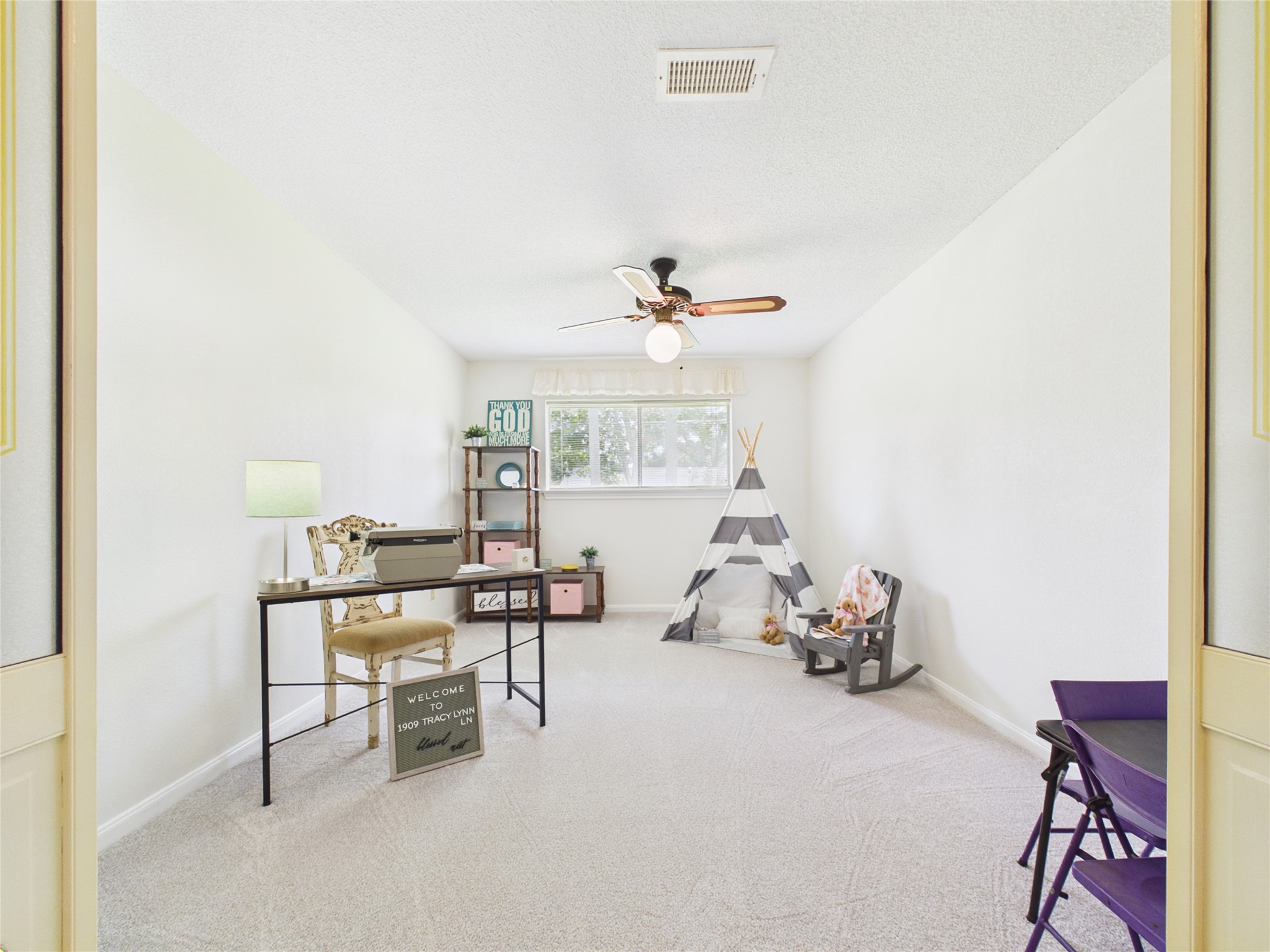 Large bonus room currently staged as a home office/place space. New carpet, great natural light and central location in the home.  How will you use it?