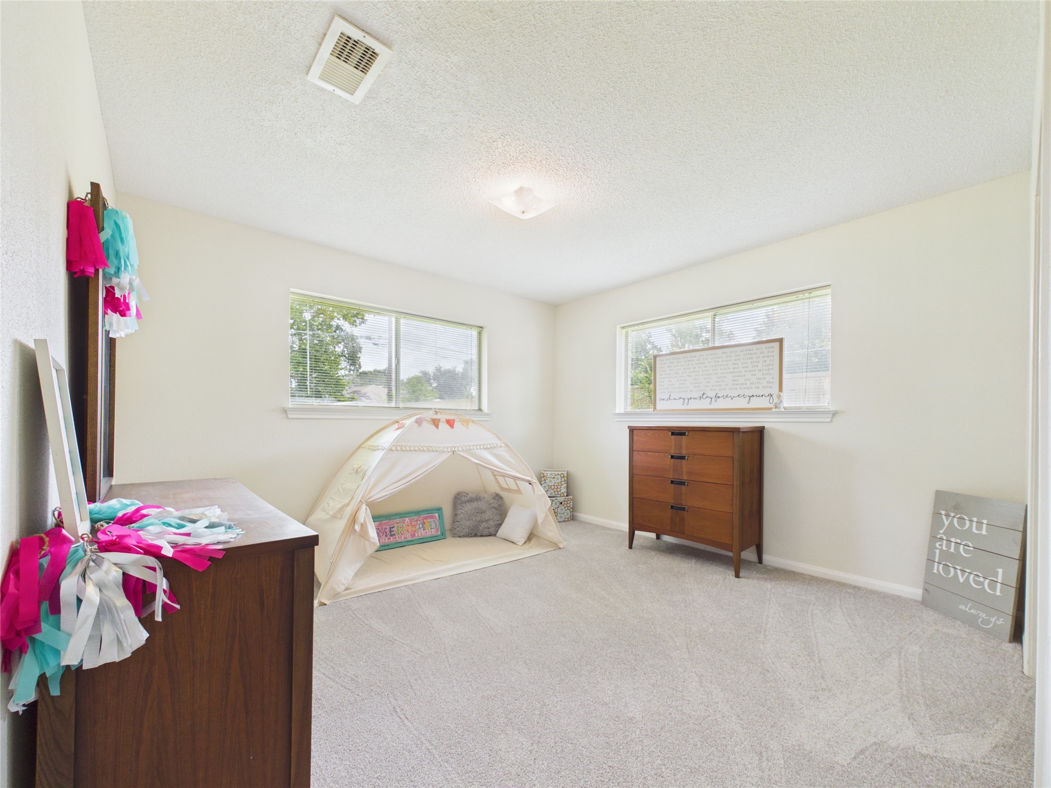 Secondary bedroom #2; new carpet and great natural light;