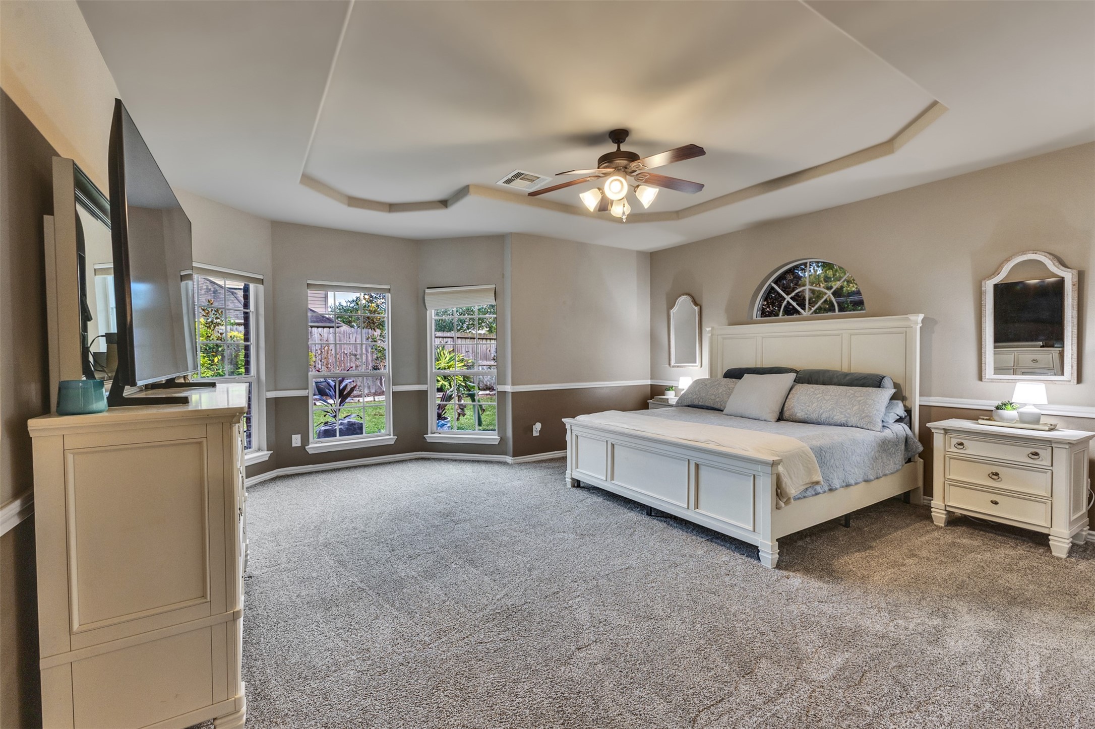Your private retreat awaits! A spacious primary suite with room to relax, recharge, and escape the everyday.