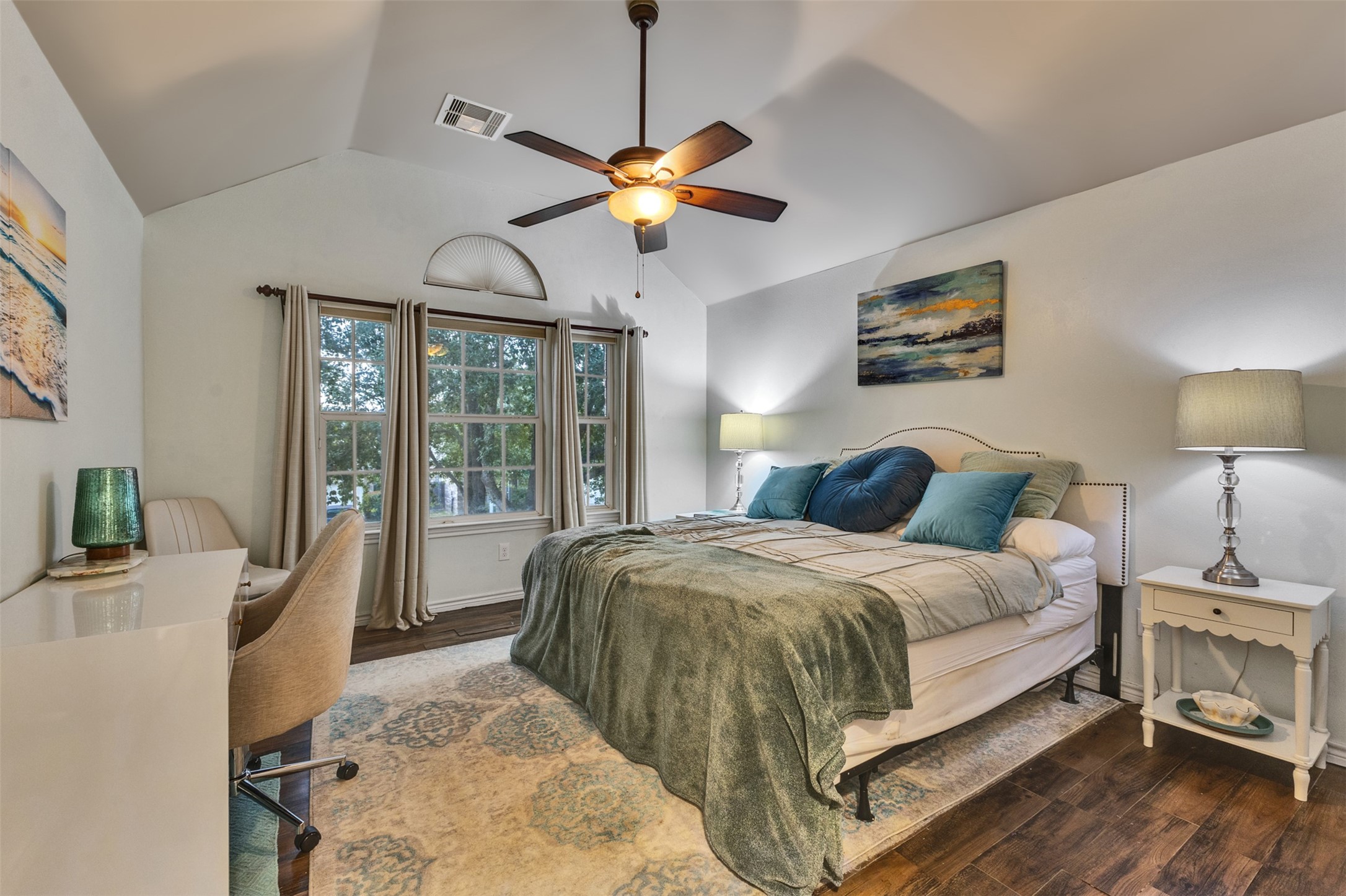 Bedroom 4: Natural light, soaring ceilings, and room for a study area make this bedroom ideal for both relaxation and everyday activities.