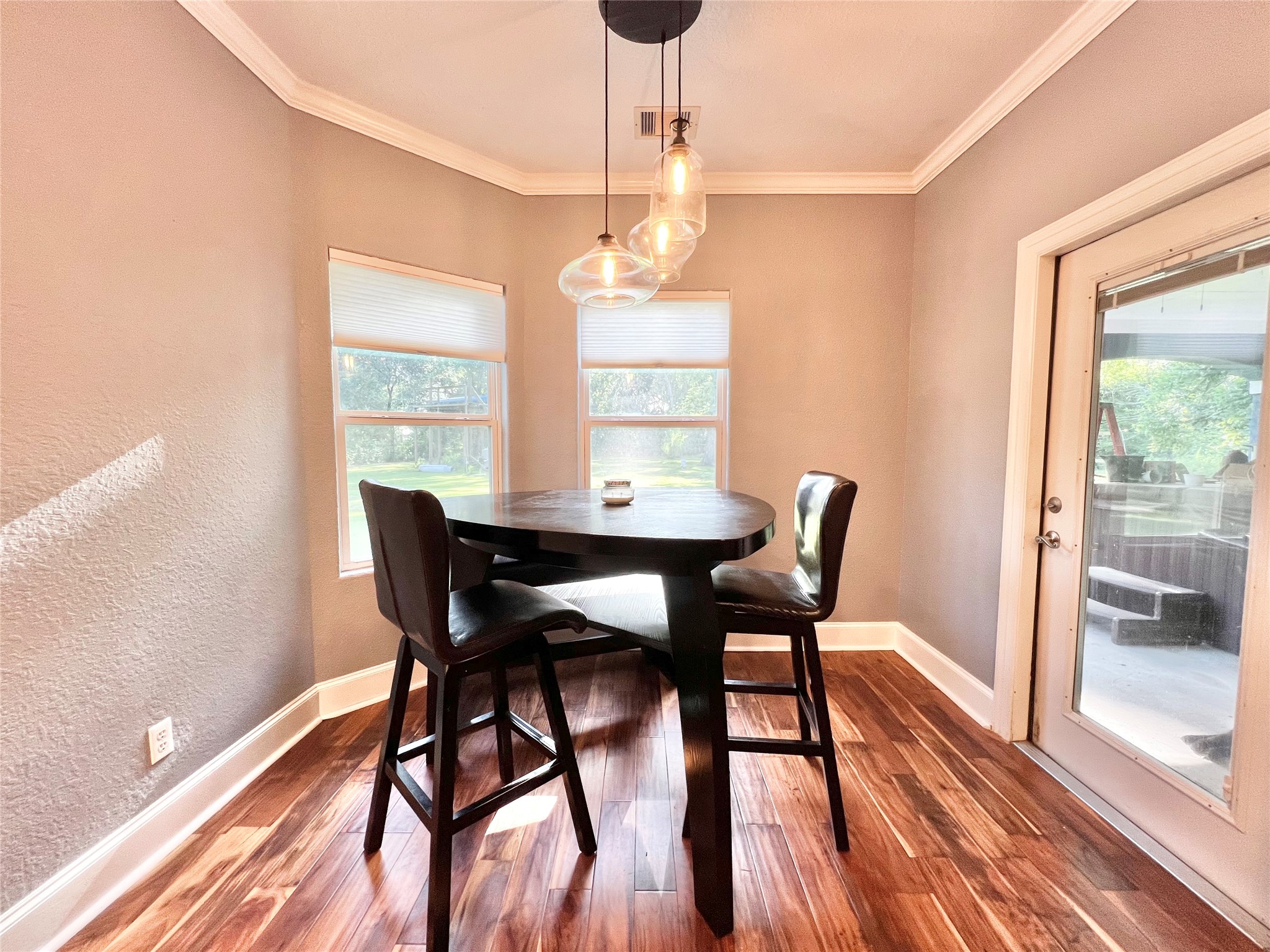 Lovely natural lighting comes through in the breakfast room