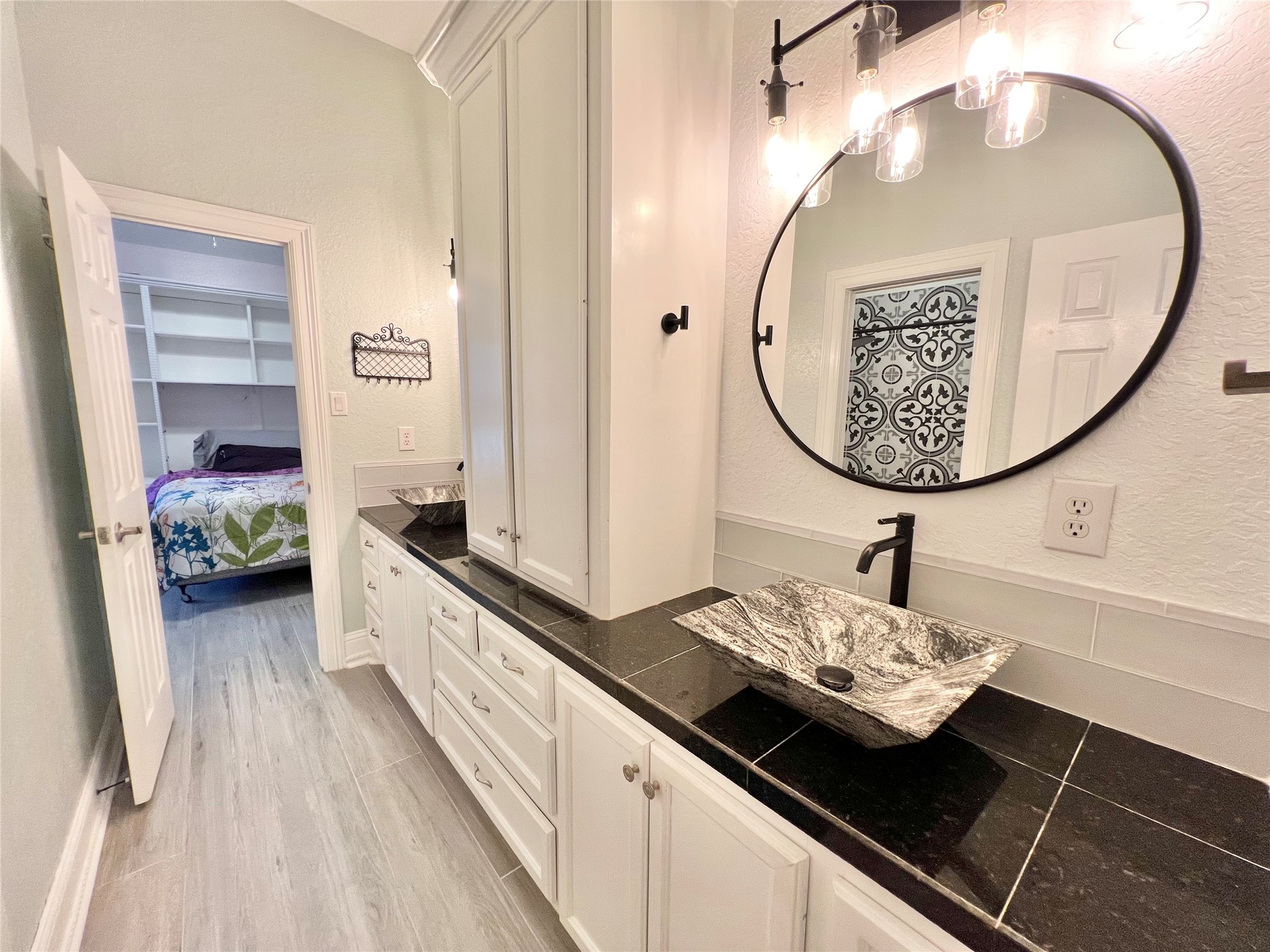 Jack and Jill oversized bathroom with 2 separate vanities as well as a private tub/shower room!