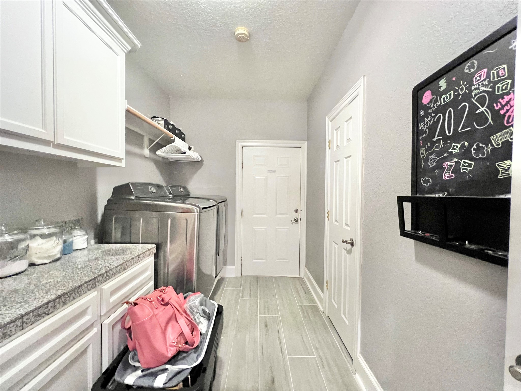 Back downstairs in the multipurpose mud/utility room