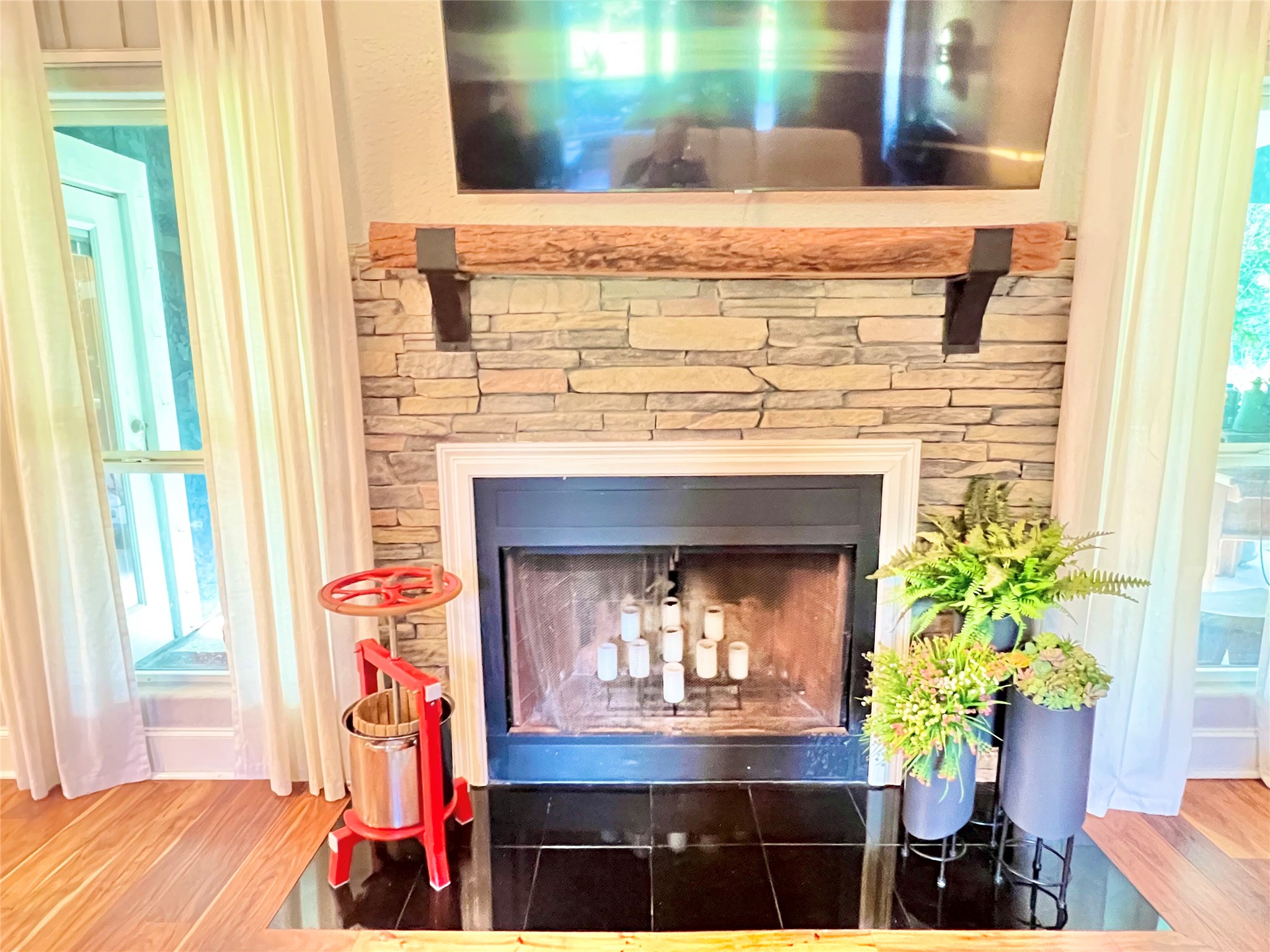 Fireplace anchors a Great focal point in living and entertaining area