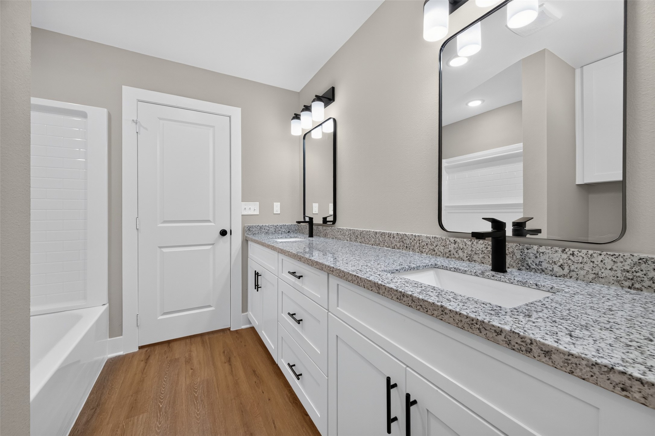 Master bathroom has shower/tub combo.