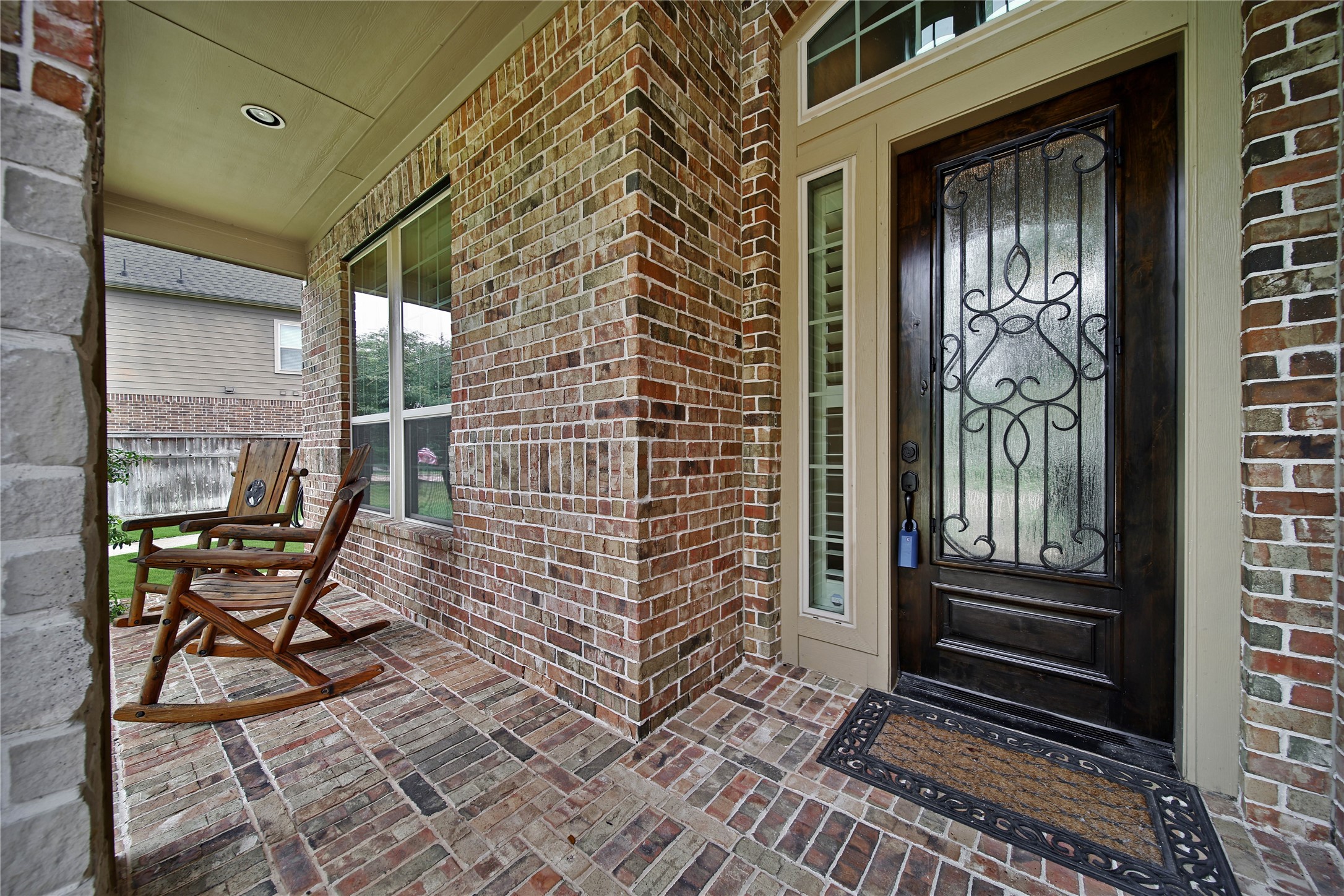 The inviting front porch is the perfect place to start your day with a cup of coffee while taking in the scenic lake views. The inviting front porch is the perfect place to start your day with a cup of coffee while taking in the scenic lake views.