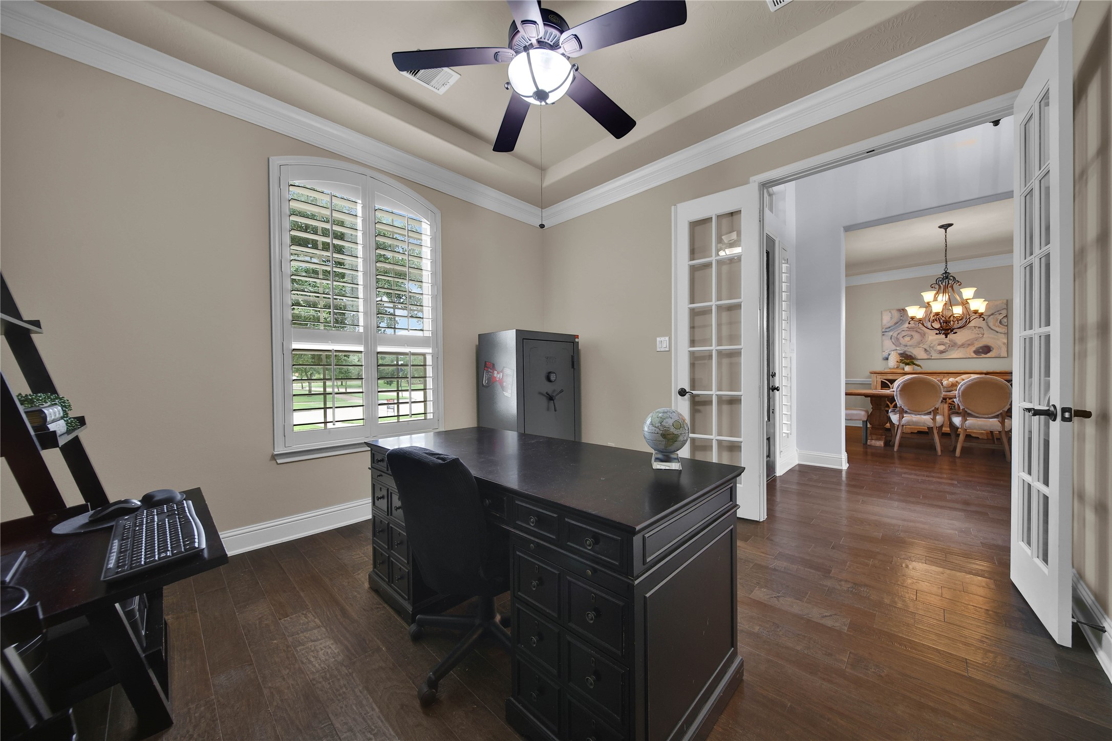 French doors provide added privacy and a quiet workspace, making working from home both comfortable and productive. French doors provide added privacy and a quiet workspace, making working from home both comfortable and productive.