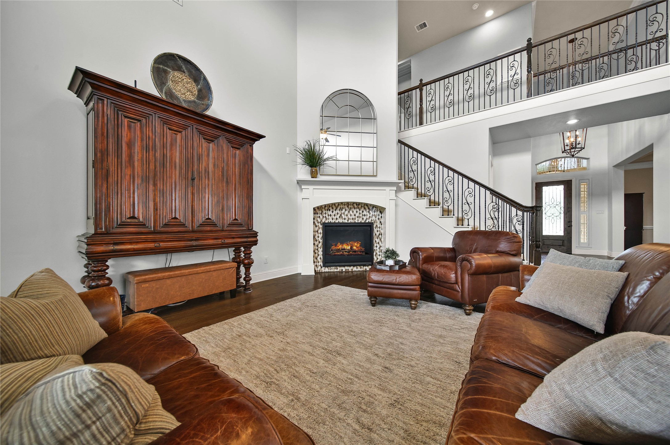 The gas log fireplace serves as a beautiful focal point, adding warmth, character, and an inviting ambiance to the room.
