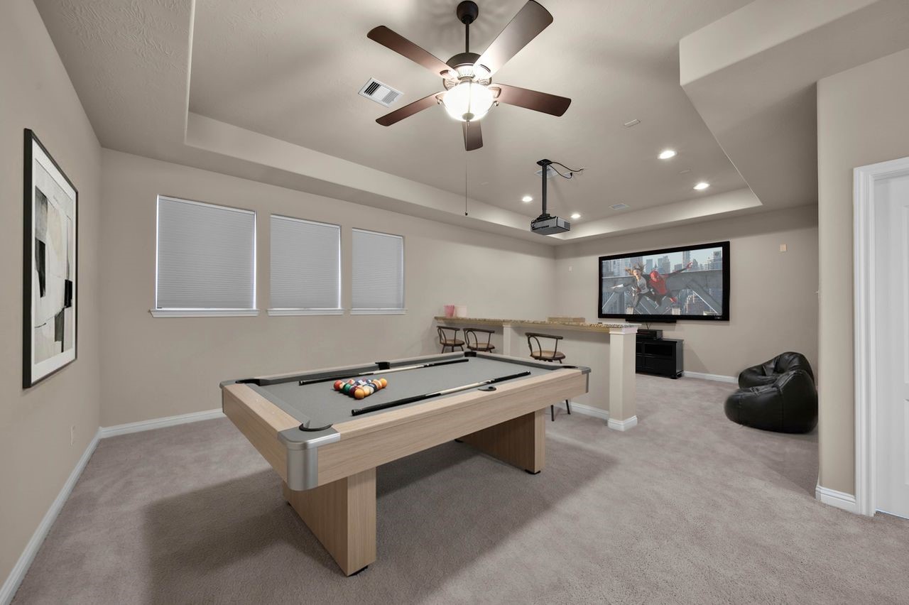 Rack Em Up! The space easily accomodates a pool table. (virtually staged).