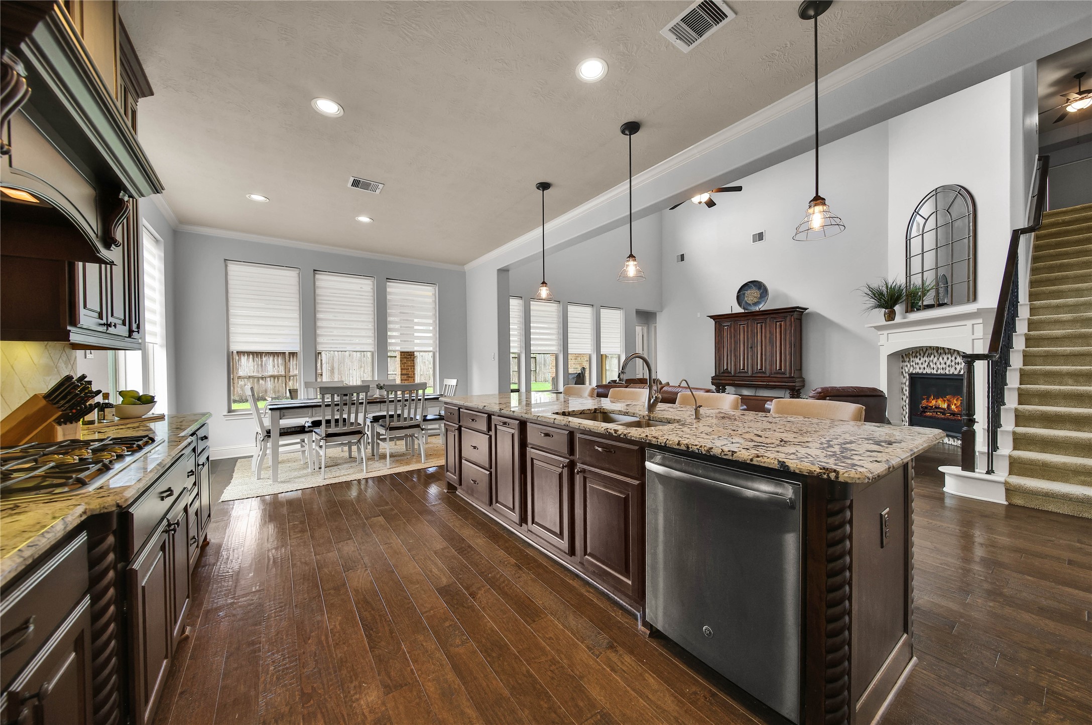 The kitchen opens seamlessly to the living room, allowing the chef to stay connected and feel like part of the action while entertaining.