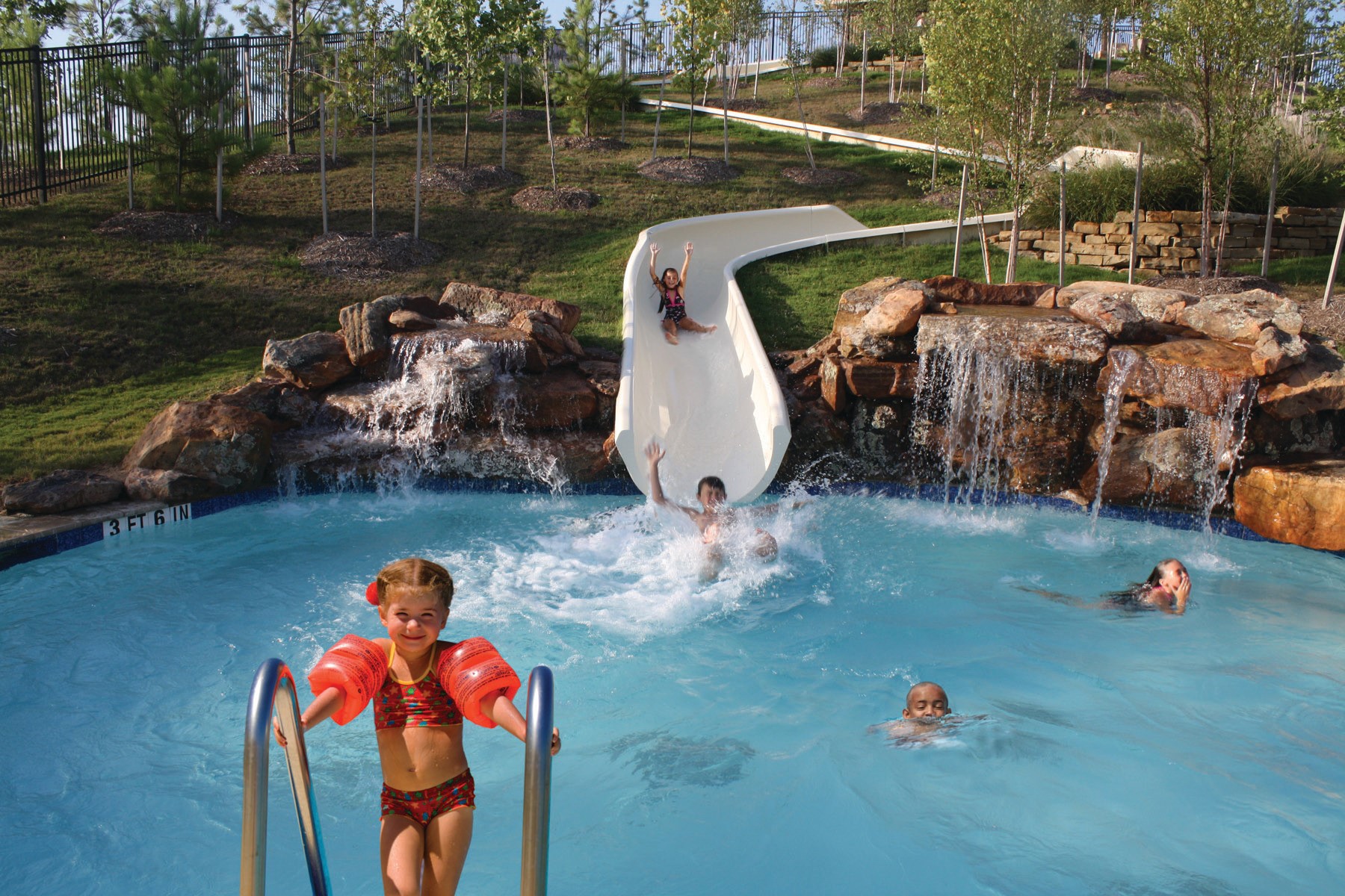 From swimming laps to sliding down our 140-foot water slide, soak up fun in the sun at our four pool complexes.