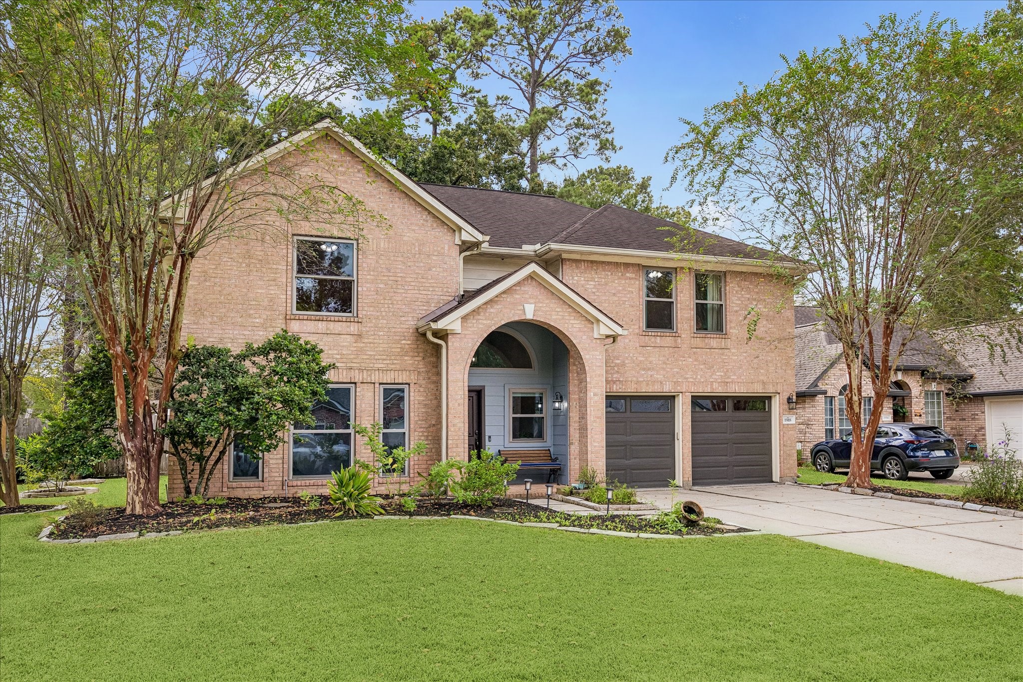Front yard with landscaping and covered porch