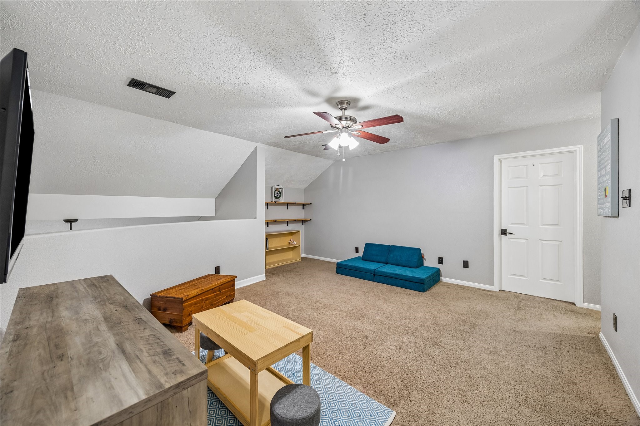Gameroom has overlook to downstairs for easy communication