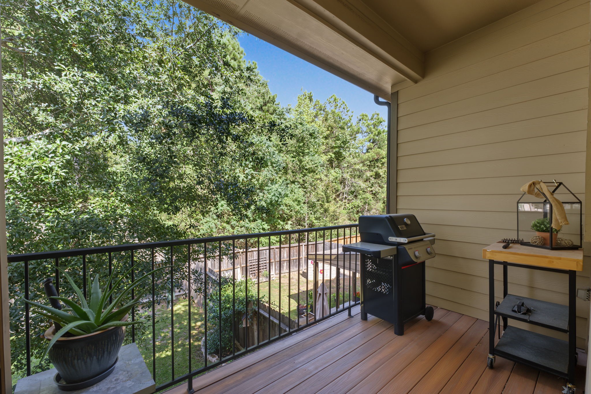 Enjoy your morning coffee or unwind with a glass of wine on your upstairs covered patio.