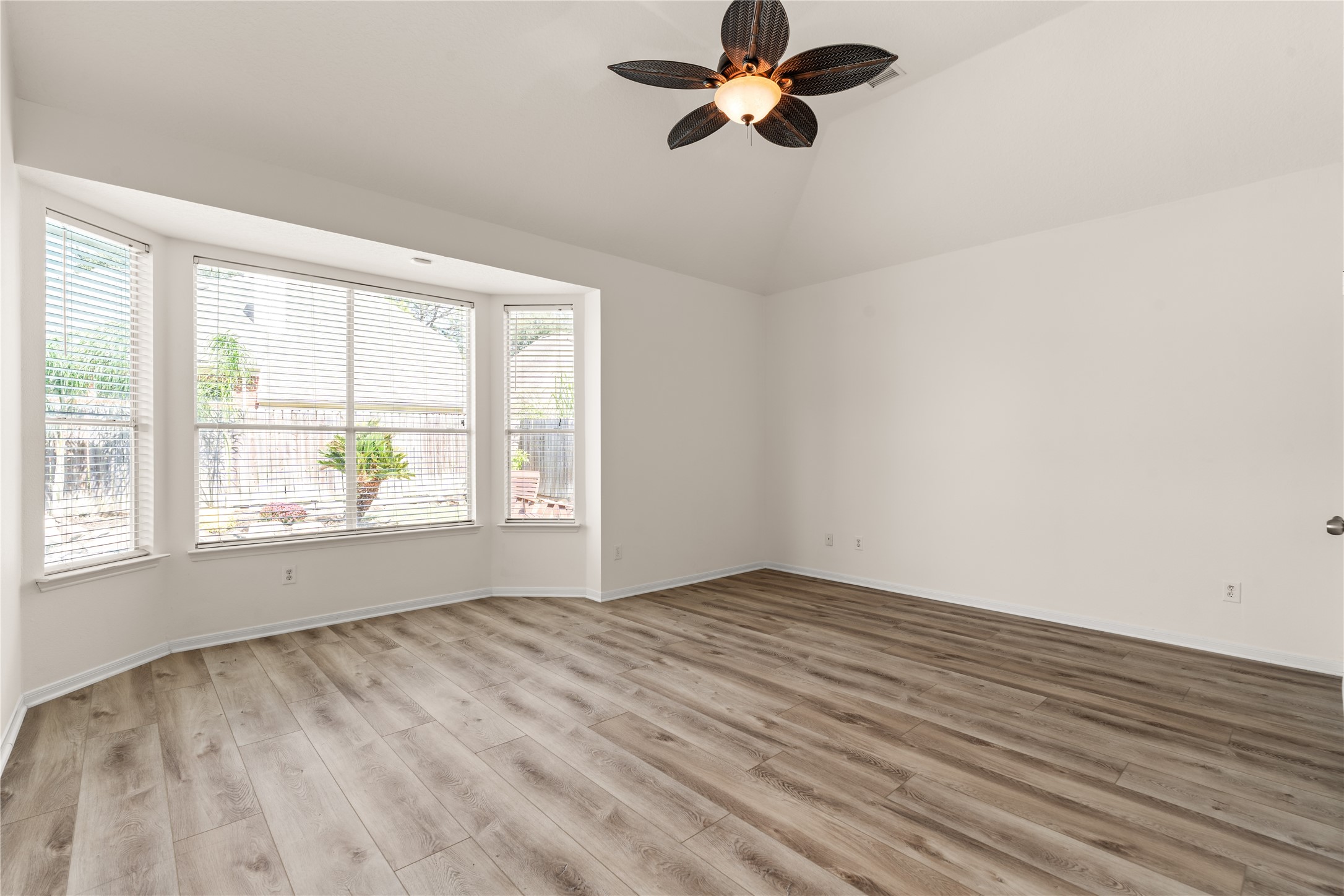Spacious Primary bedroom with pool view!