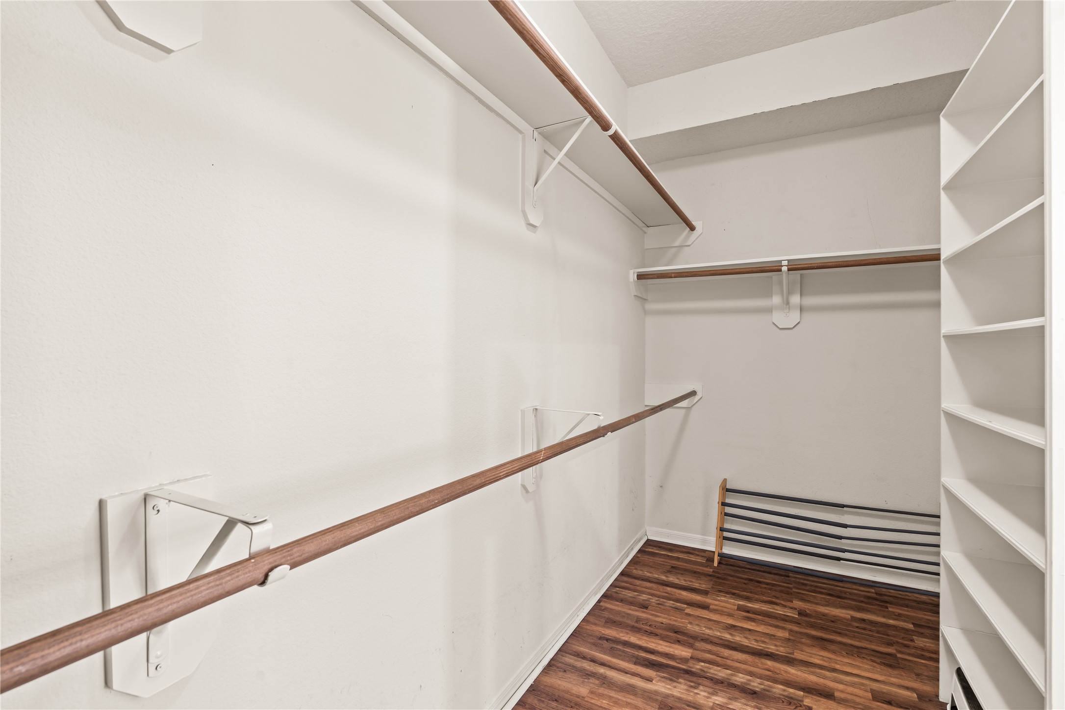 Primary bedroom walk-in closet.