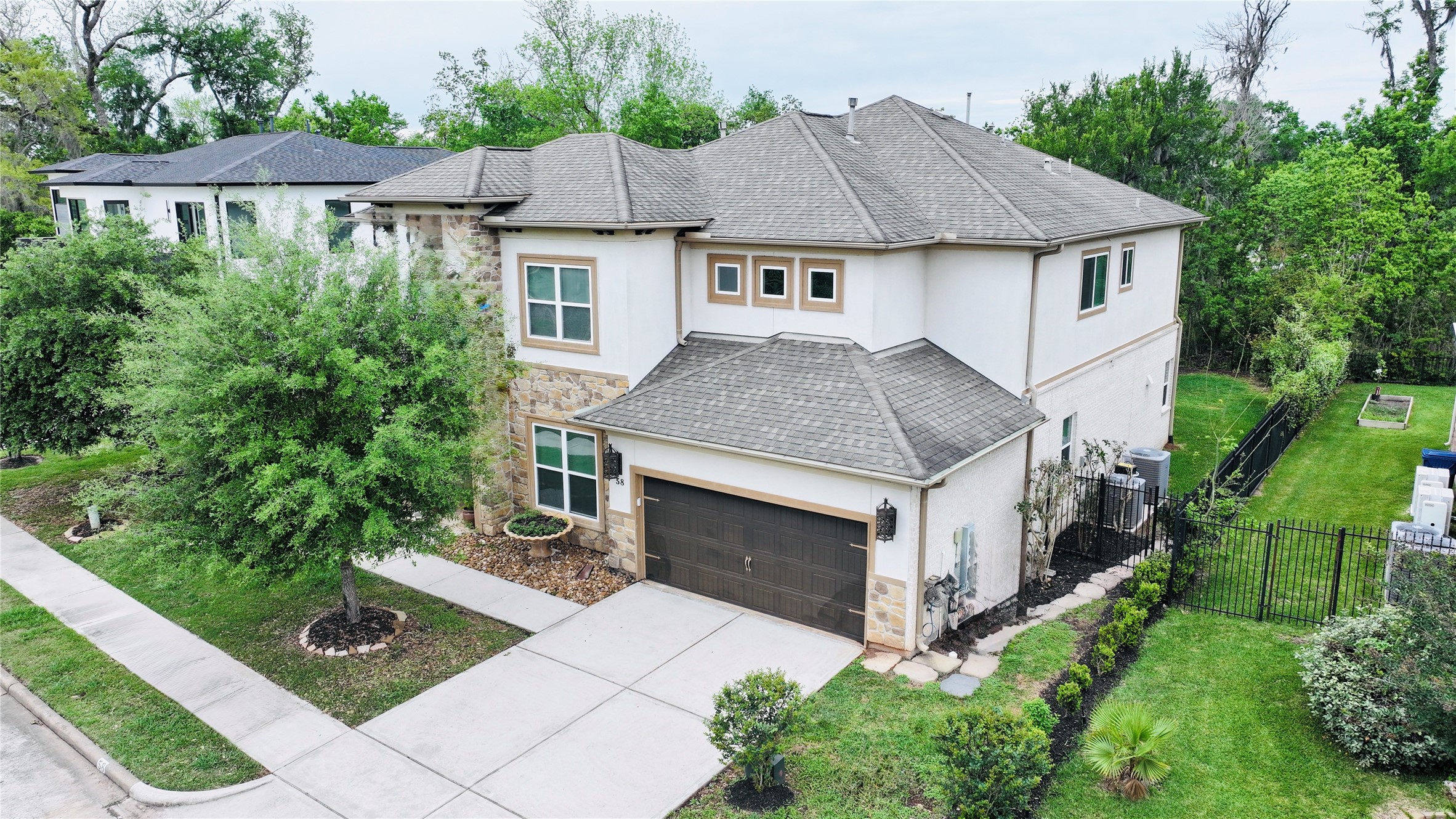 A 4,000 SF beauty, no back neighbors, iron gates, sunroom and patio in backyard, million dollar neighbors in a private and gated island.
