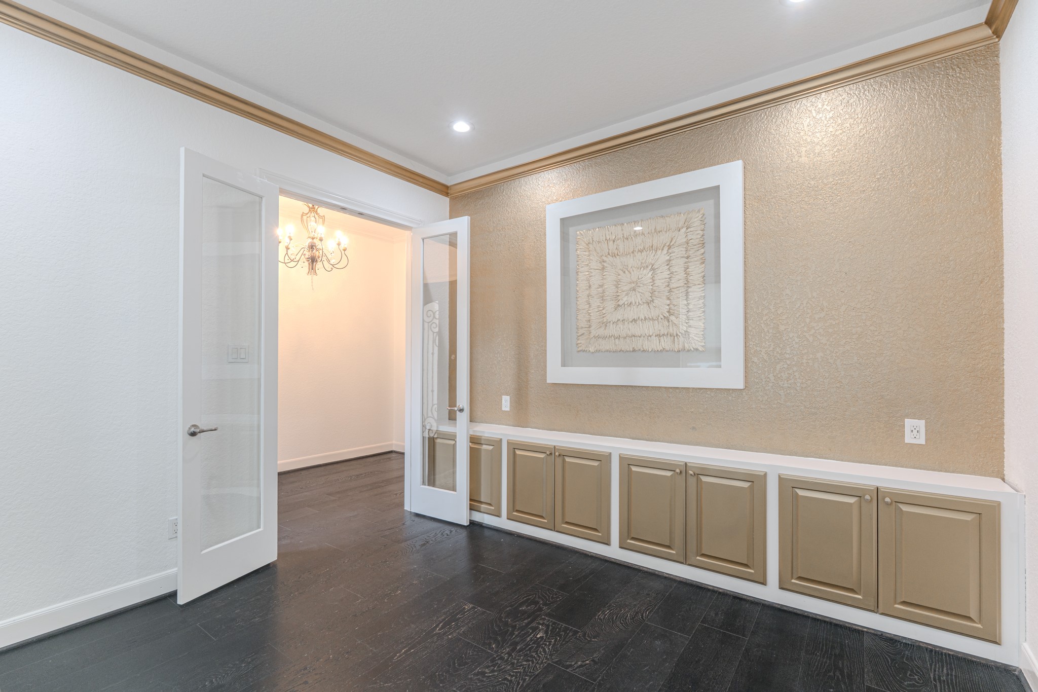Home office or study with french doors, Builtin cabinets for storage.