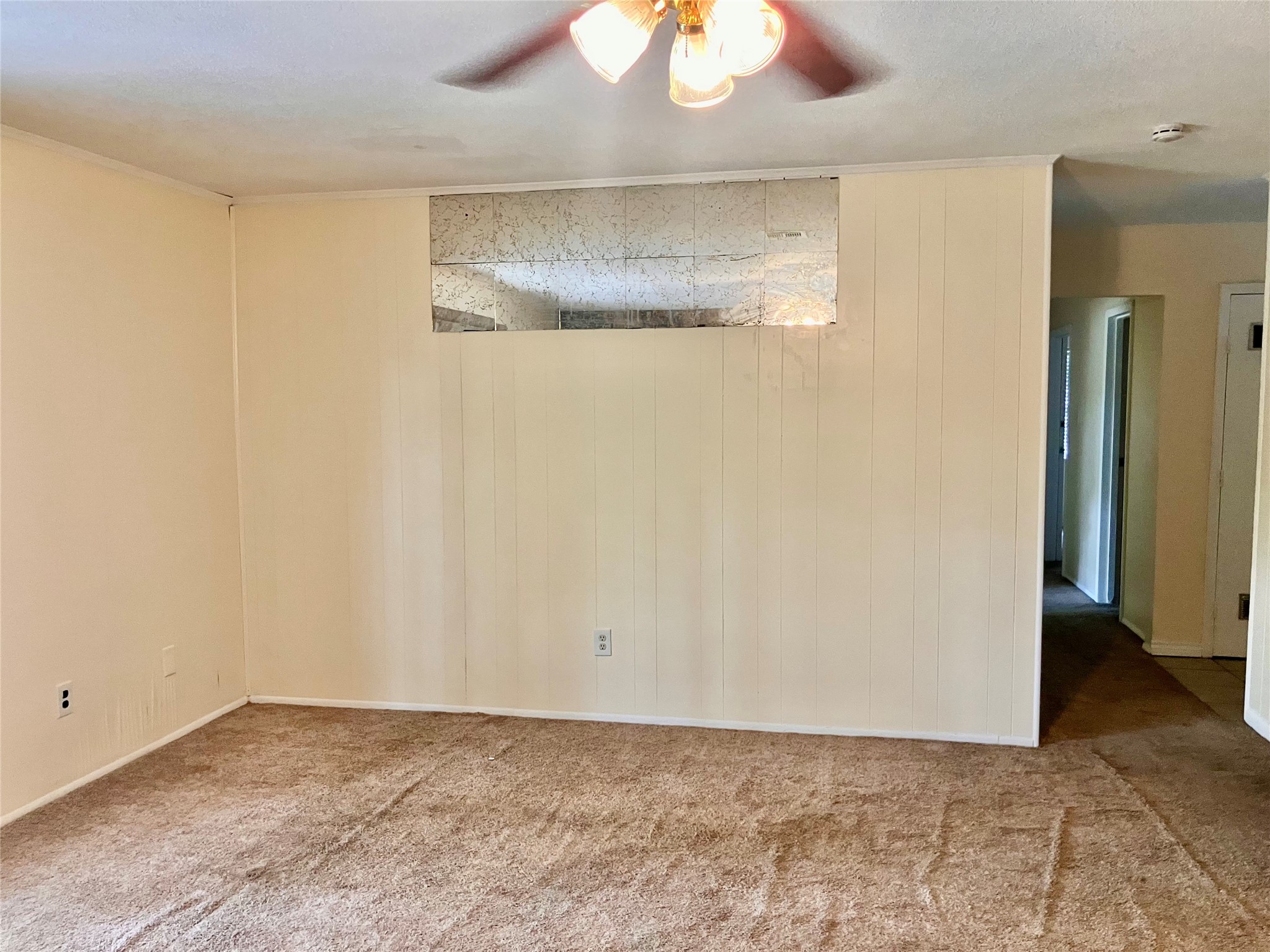 living area opens to hall way and dining area