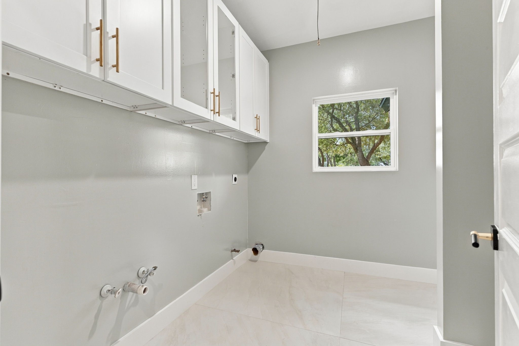Spacious utility room with natural light
