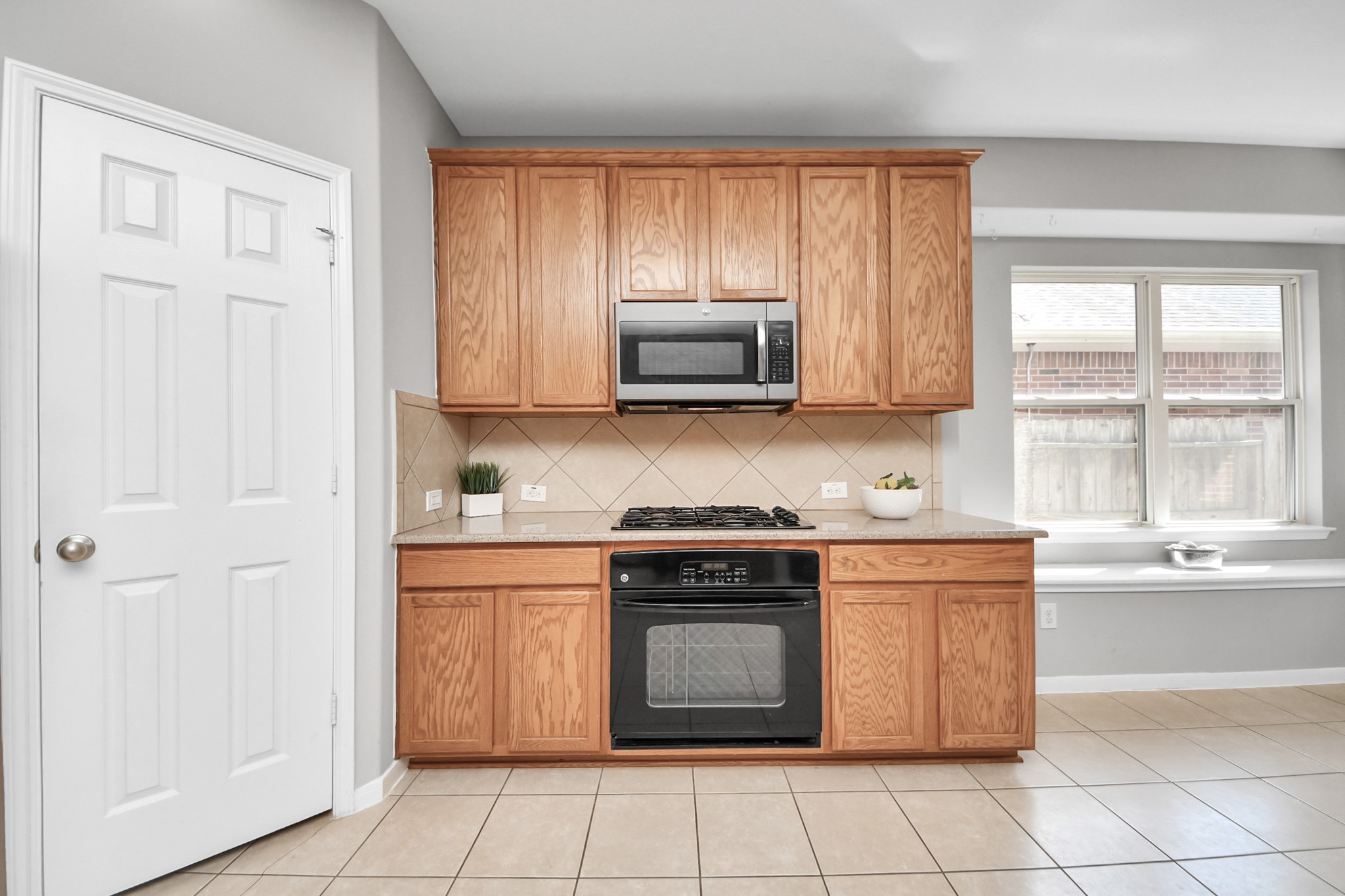 Gas cooktop and built in microwave