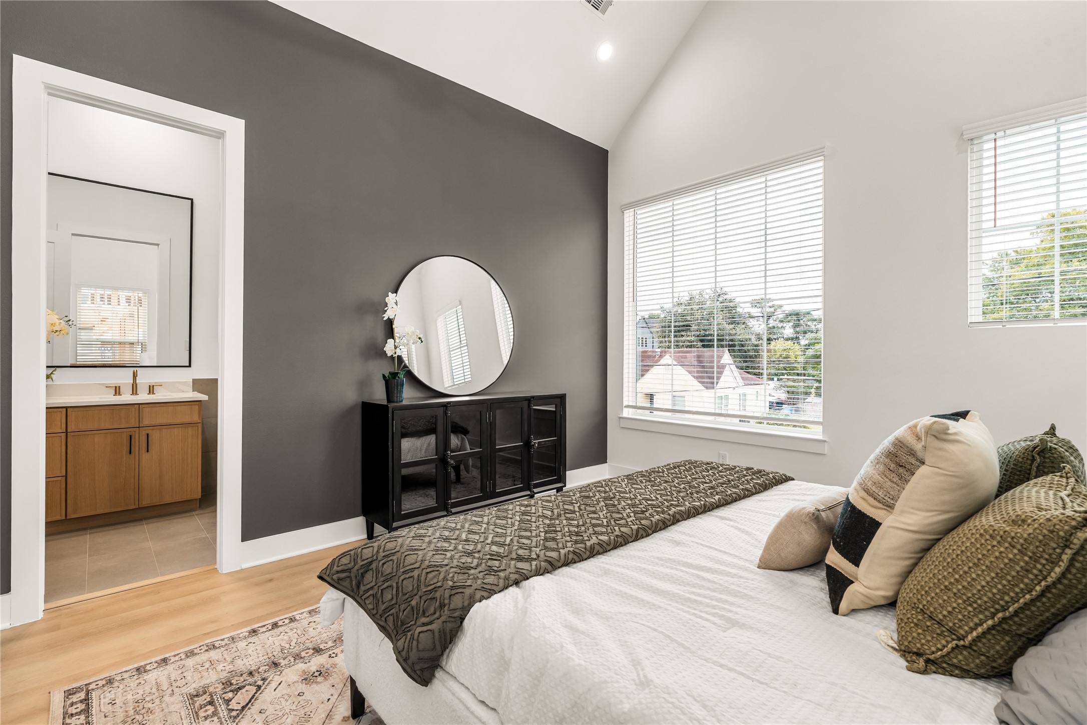 Primary suite offering space for king-sized furniture and direct access to the private ensuite bath.