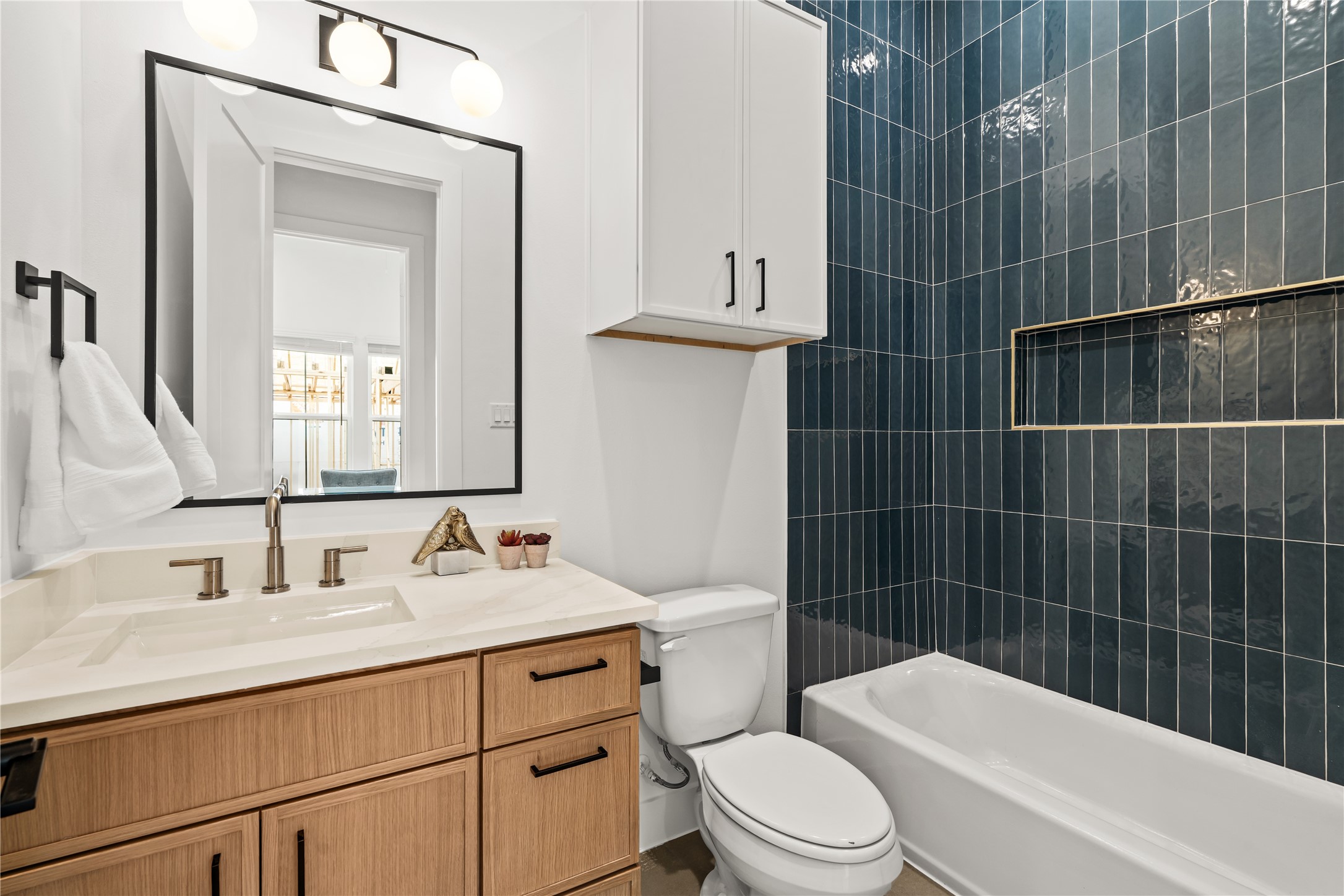 Convenient upper-level full bath serving the secondary bedrooms.