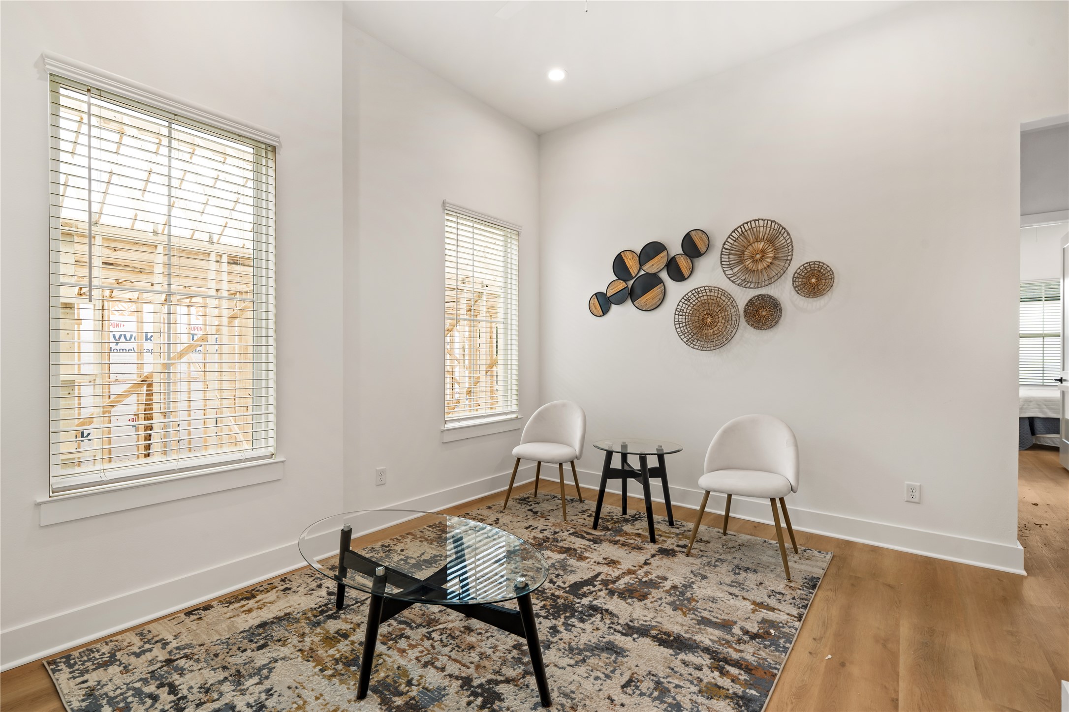 Sunlit secondary seating area or flexible flex space for an upstairs lounge or work nook.