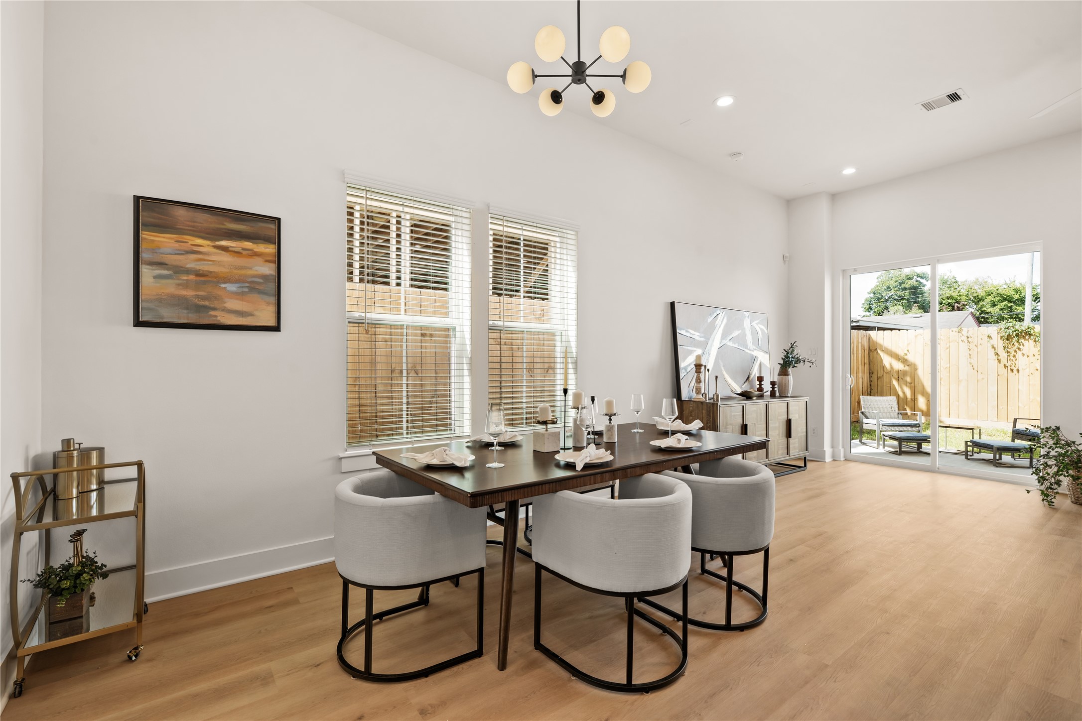 Dedicated dining area positioned near patio access for effortless indoor-outdoor hosting.