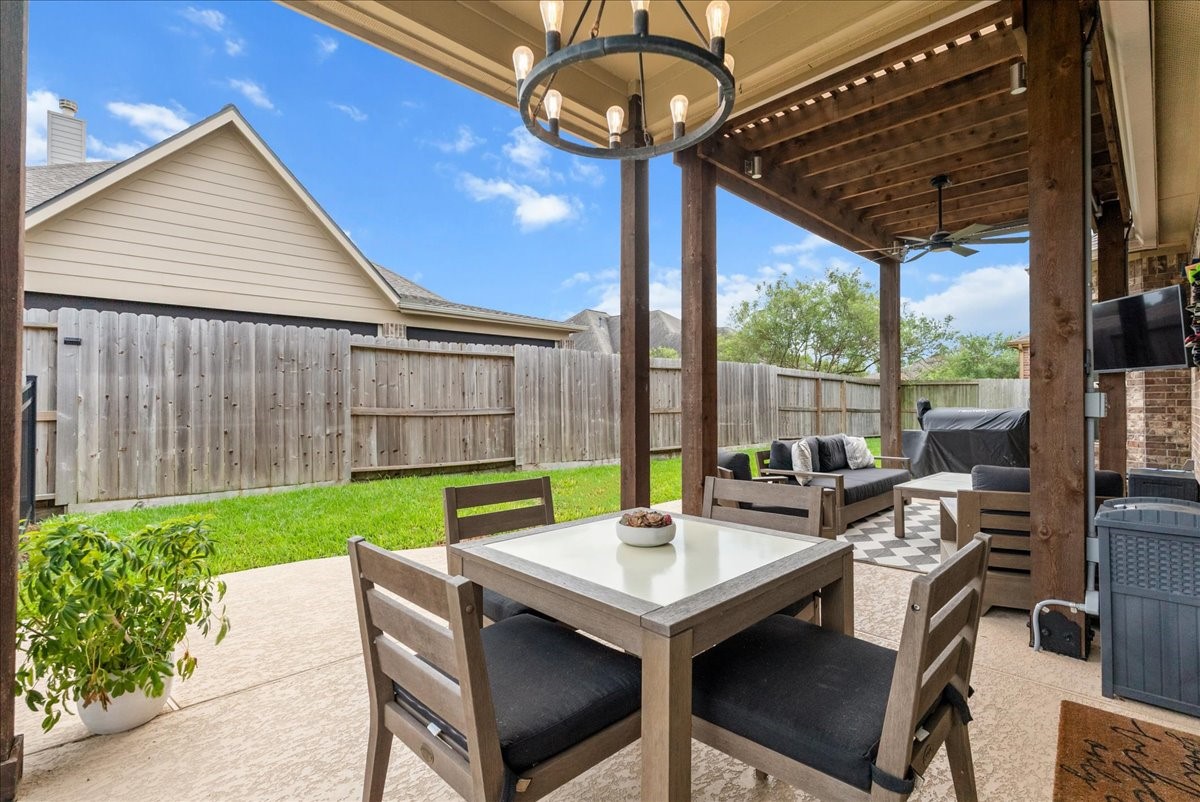 Step outside to your private backyard oasis featuring a sparkling pool, extended patio perfect for entertaining, and plenty of additional yard space for the kids to play.