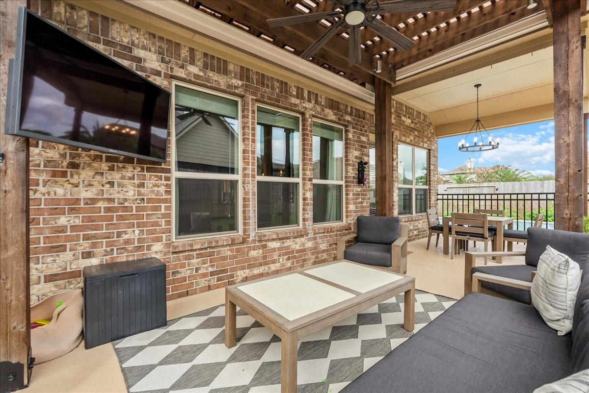 Step outside to your private backyard oasis featuring a sparkling pool, extended patio perfect for entertaining, and plenty of additional yard space for the kids to play.