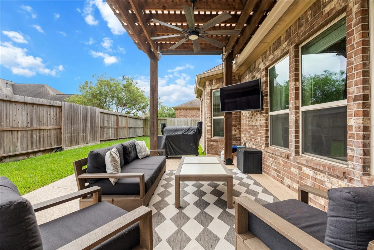 Step outside to your private backyard oasis featuring a sparkling pool, extended patio perfect for entertaining, and plenty of additional yard space for the kids to play.