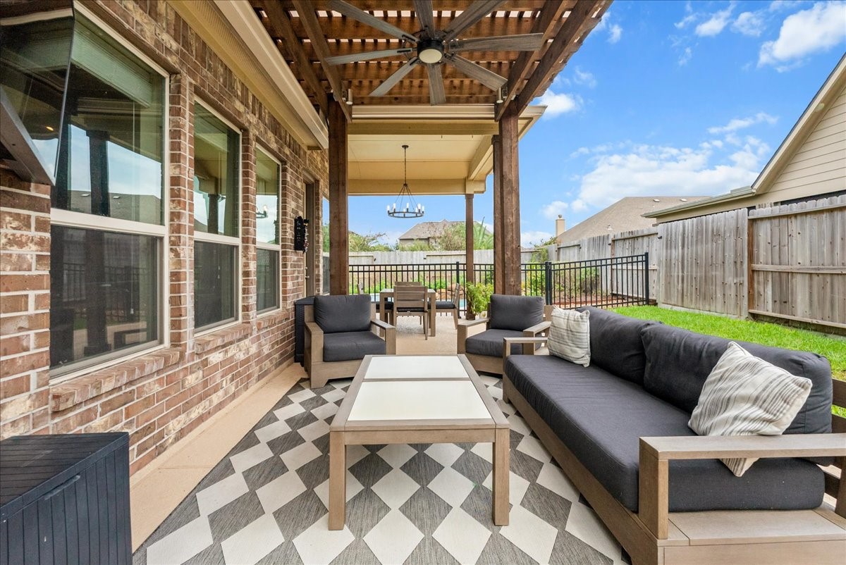 Step outside to your private backyard oasis featuring a sparkling pool, extended patio perfect for entertaining, and plenty of additional yard space for the kids to play.