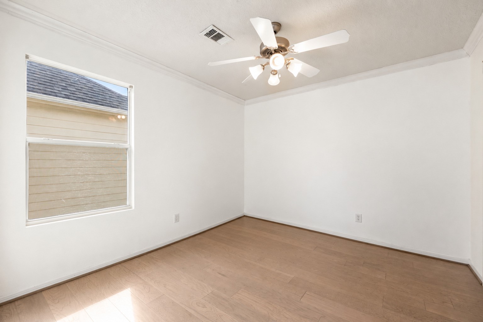 Generously sized secondary bedrooms provide comfort and flexibility for family or guests.