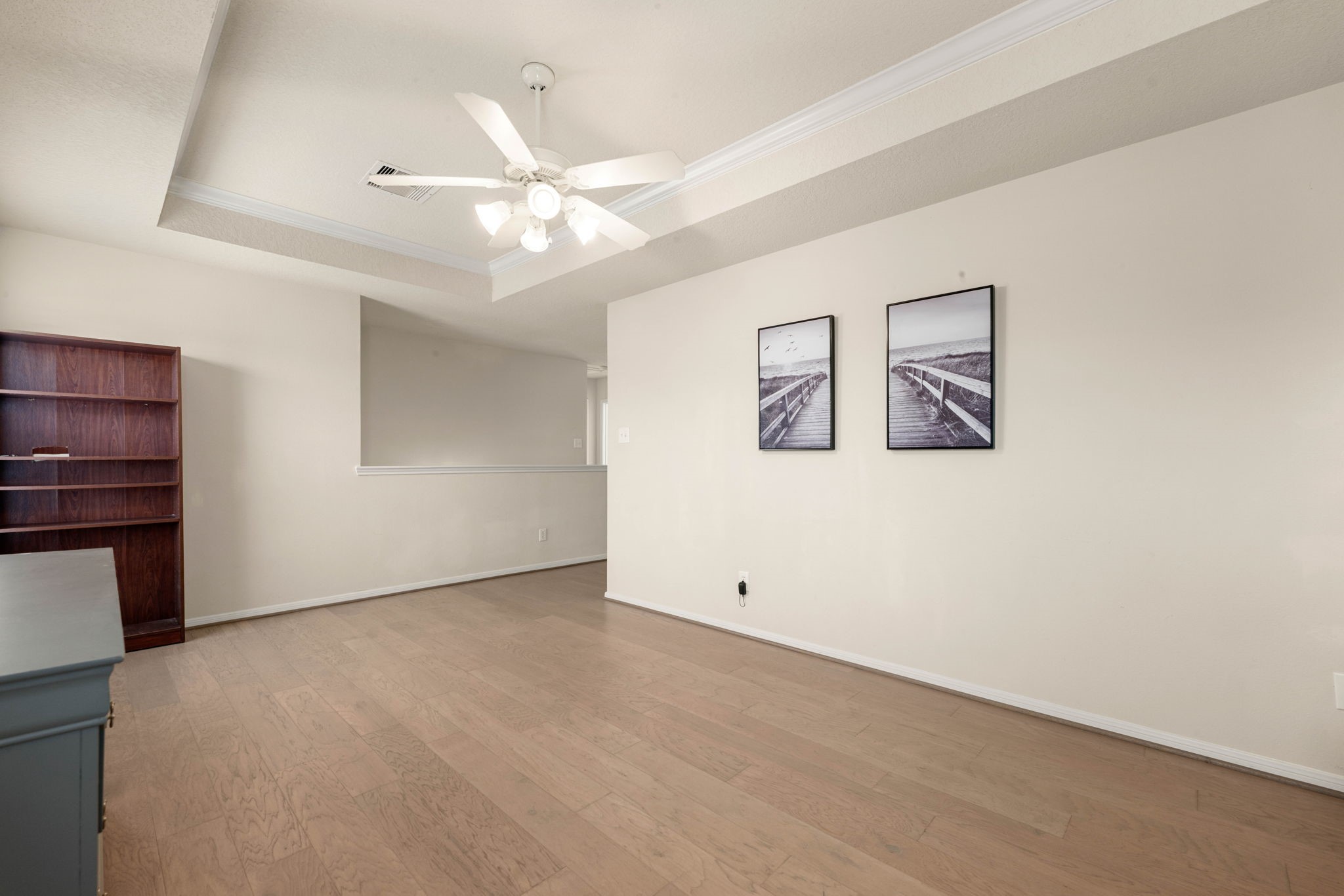 Versatile upstairs game room can easily serve as a second family room or media room.