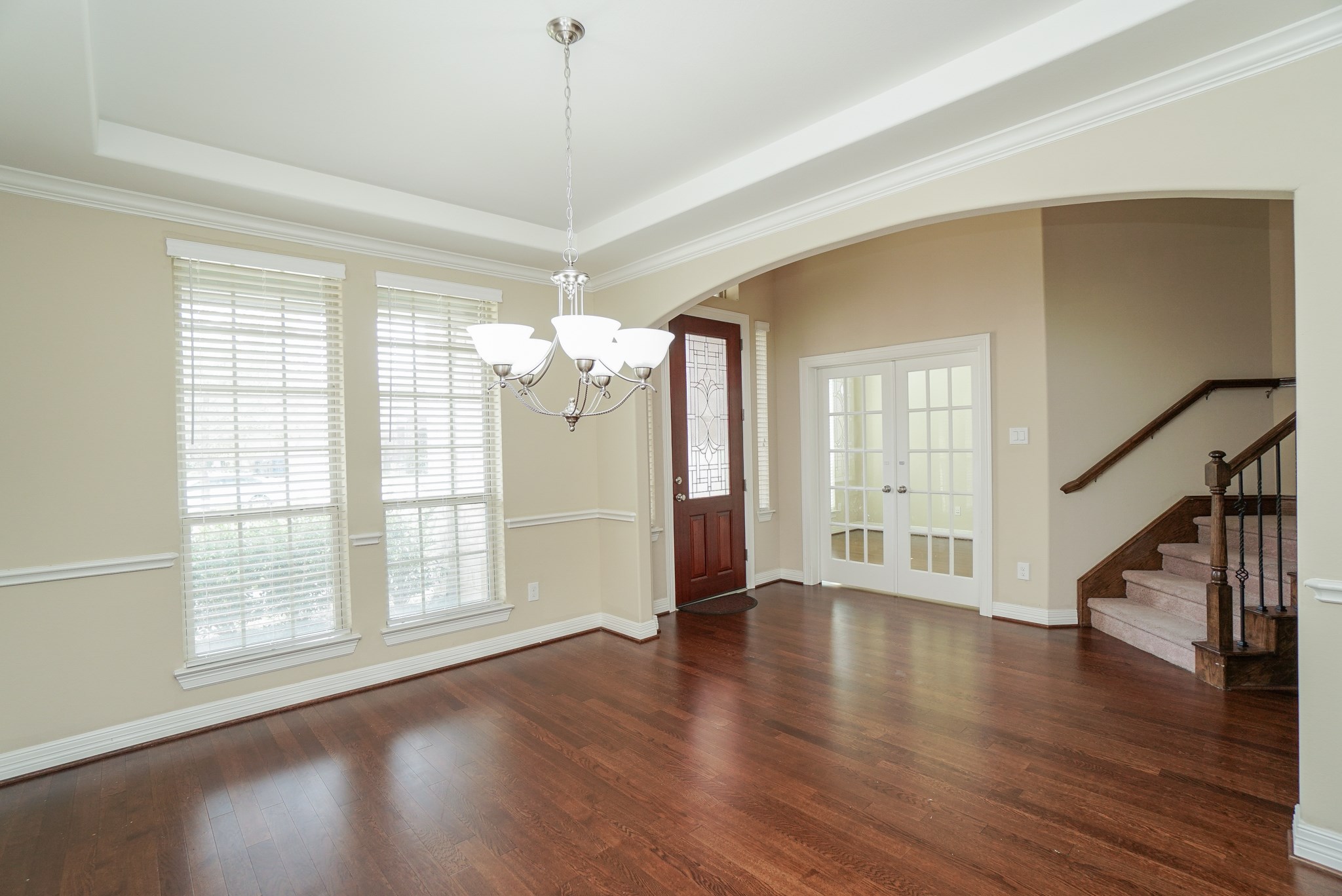 This is the view from the dining room looking at the front door. The French Doors you see to the left of the front door is the office. This is the view from the dining room looking at the front door. The French Doors you see to the left of the front door is the office.