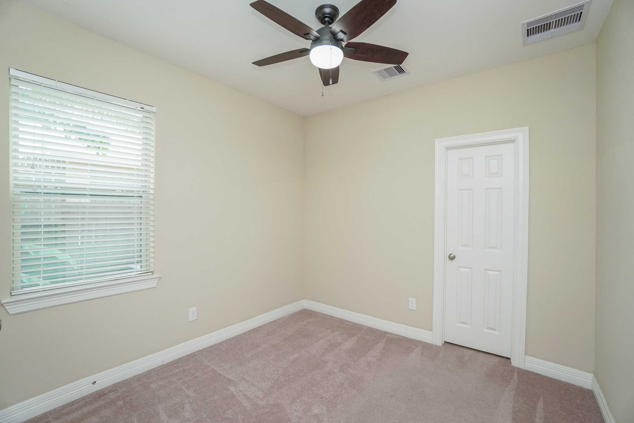 This is the SECOND BEDROOM ON THE MAIN FLOOR!!!  No always easy to find a two story home with two bedrooms on the main floor.  This second bedroom has its own ensuite.